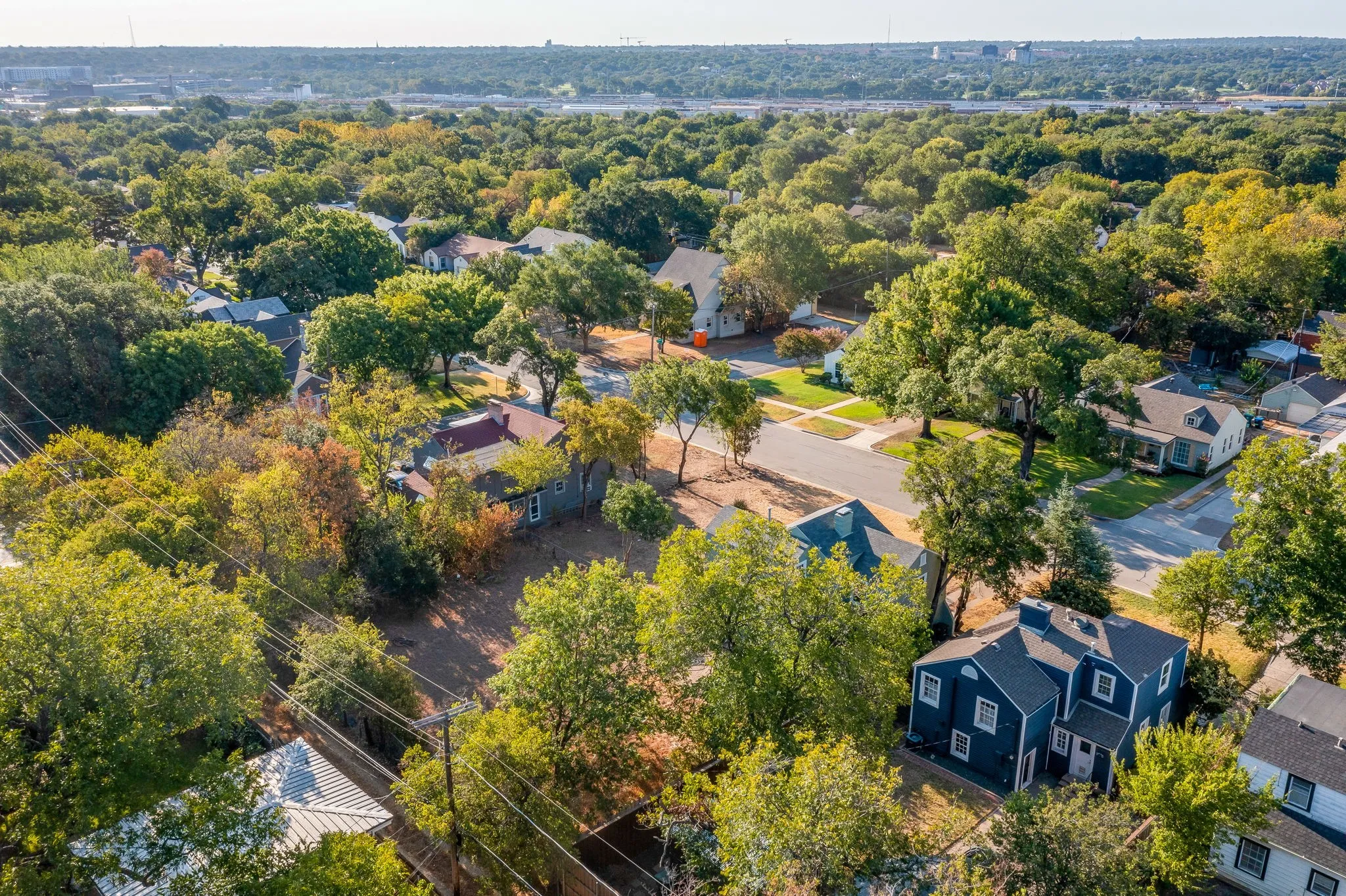Aerial View from behind lot and home showing street view