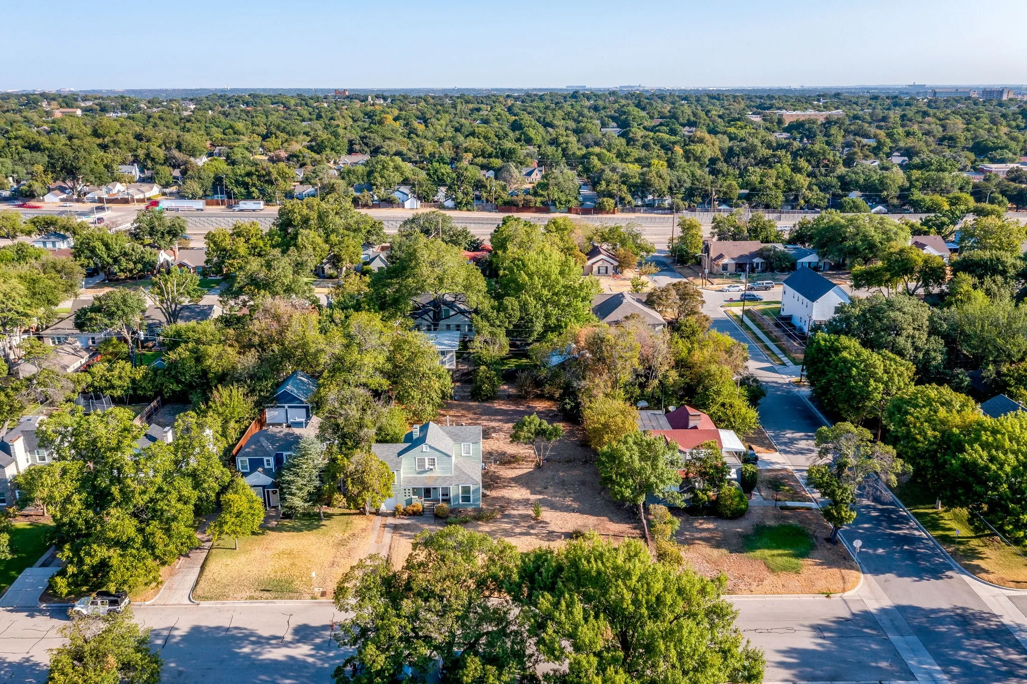 Aerial view of lot and home