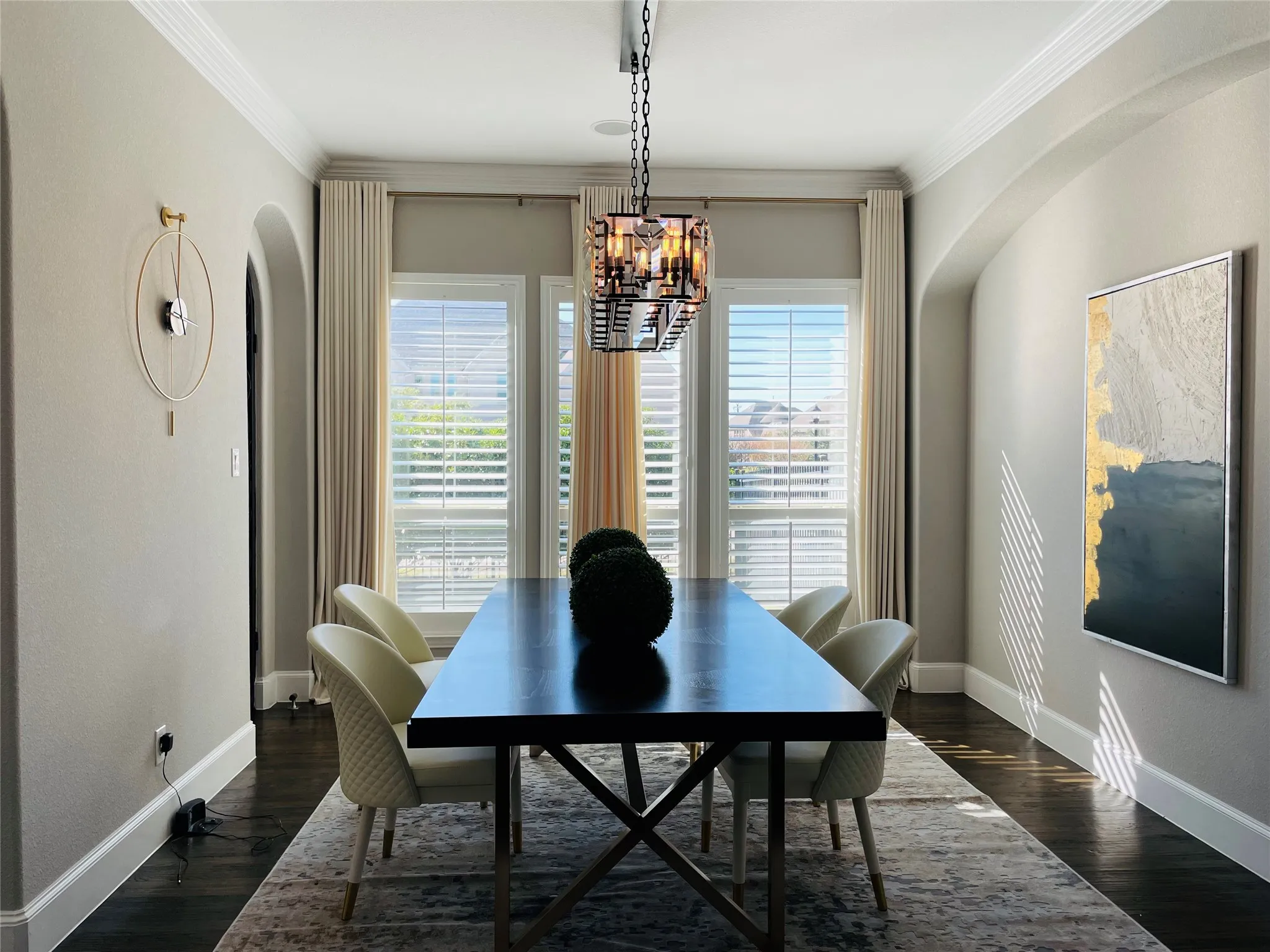 Dark wood-finish flooring with a decorative area rug
