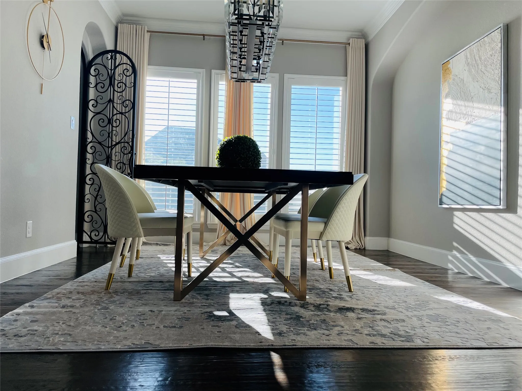 Dark wood-finish flooring with a decorative area rug