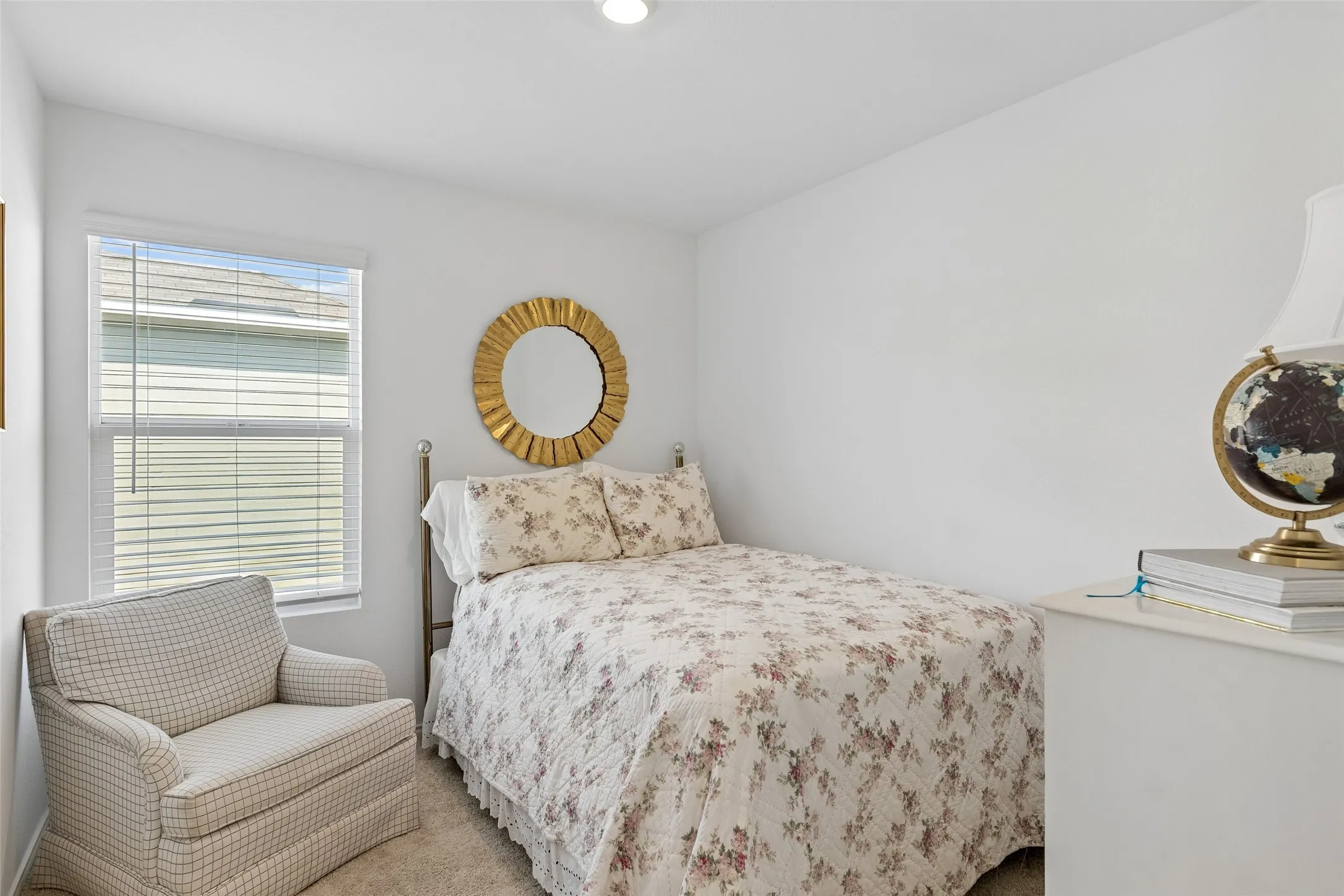 Recessed lighting, window with blinds, and light-colored wall-to-wall carpeting