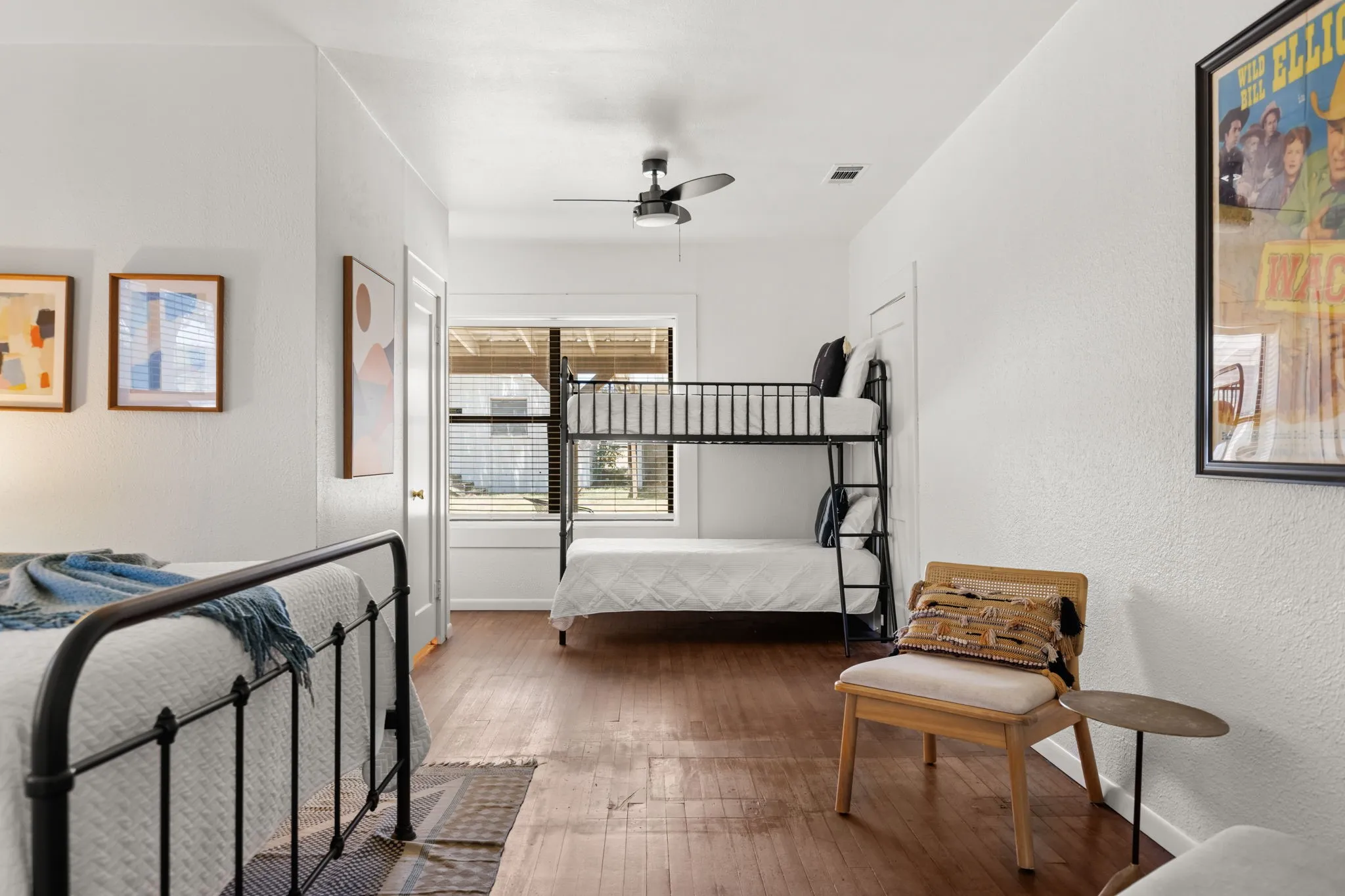 Recessed lighting, ceiling fan, wood-finish flooring, white walls, and a window with blinds