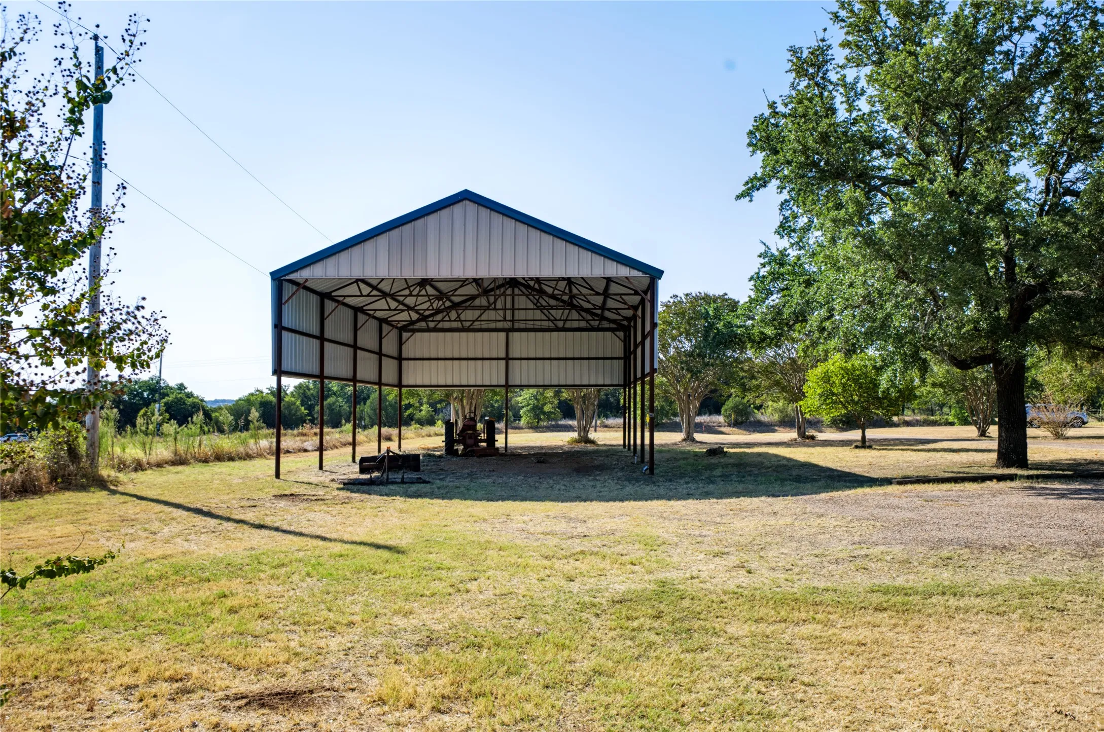 Huge covered area with full hookups for an RV.