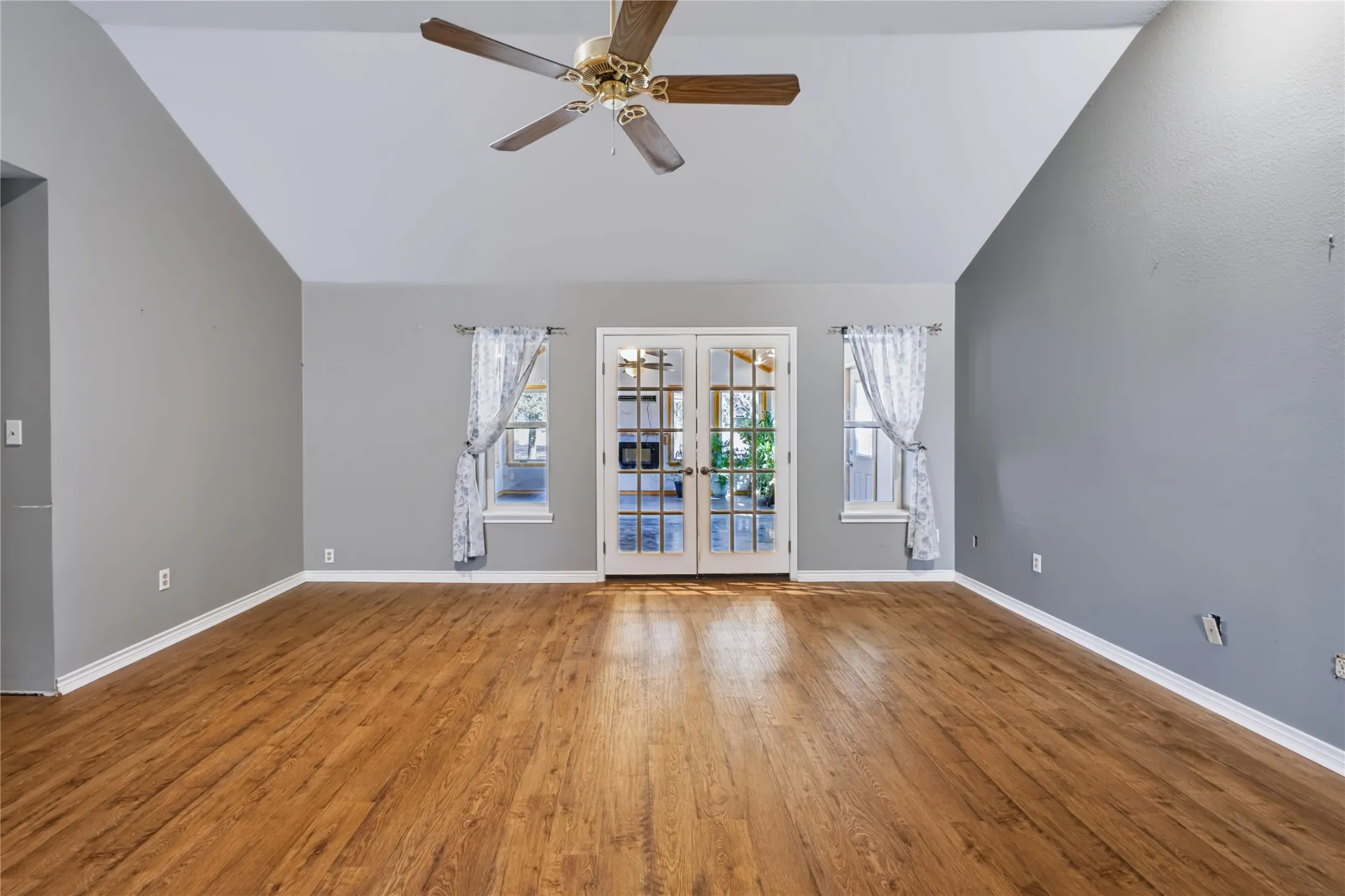 Living room leads to Sunroom