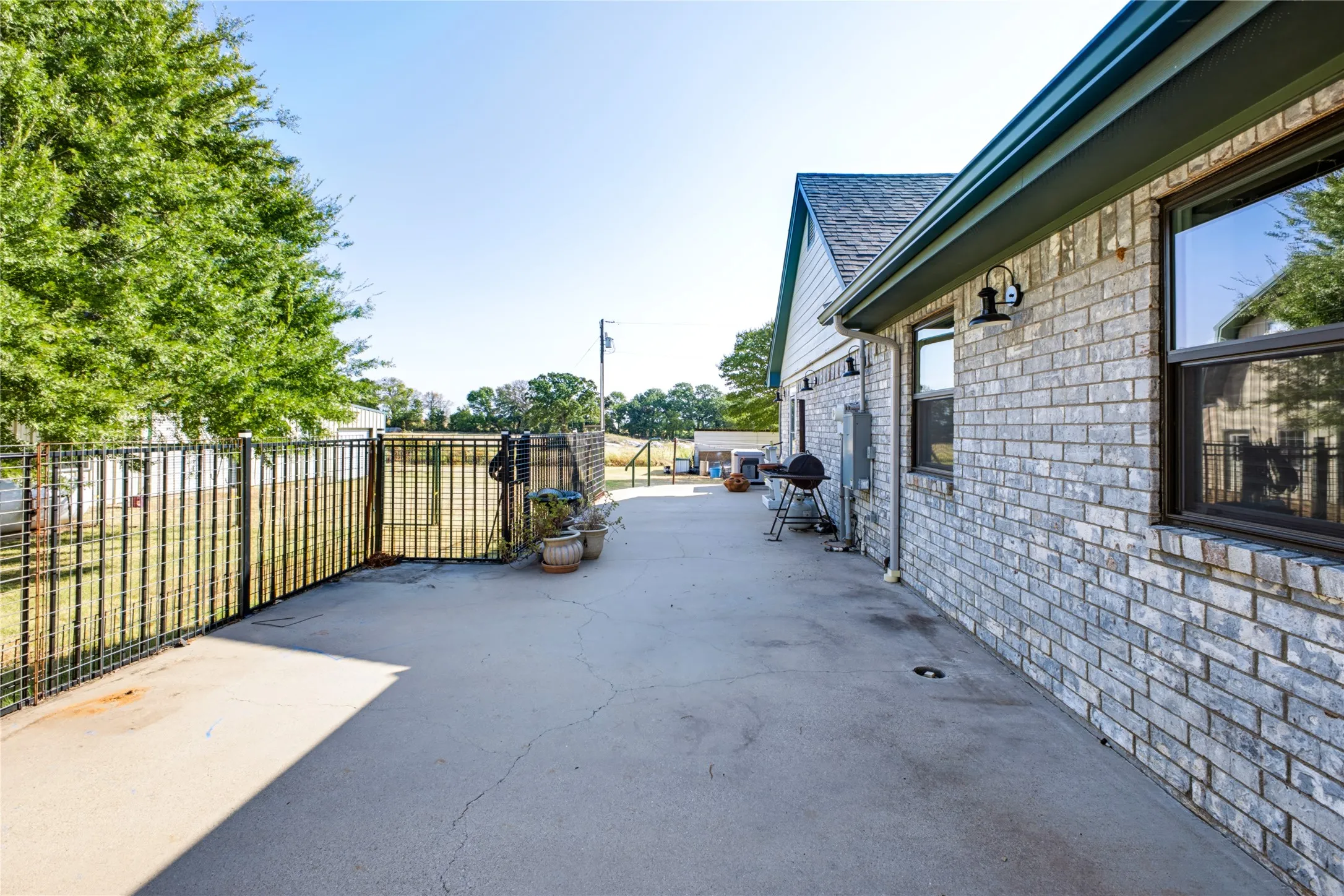 Large porch runs along back of home.