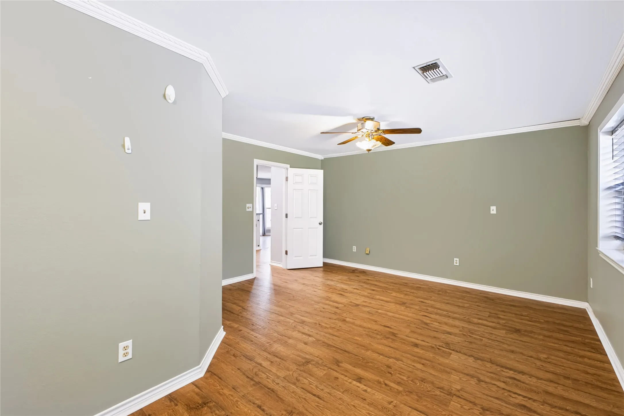 Primary Bedroom is split from others.