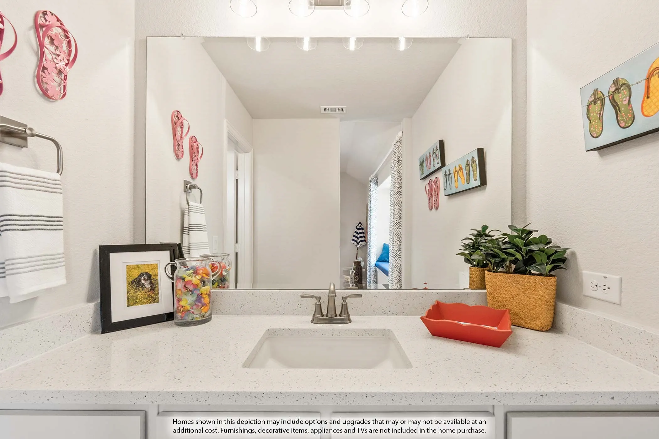 White countertop with integrated rectangular sink and a brushed nickel faucet