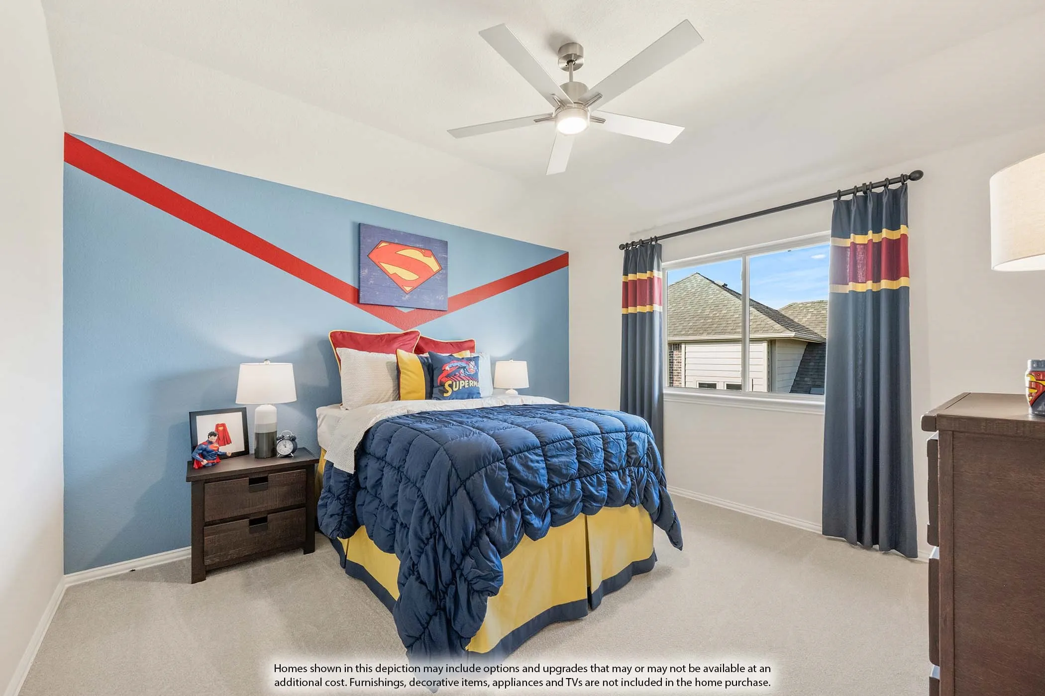 Carpeted bedroom with a single window, a ceiling fan with integrated lighting, and a painted accent wall