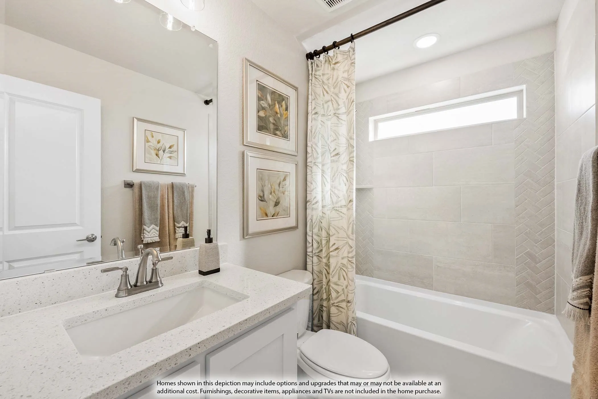 Integrated vanity featuring a single sink and a light-toned countertop