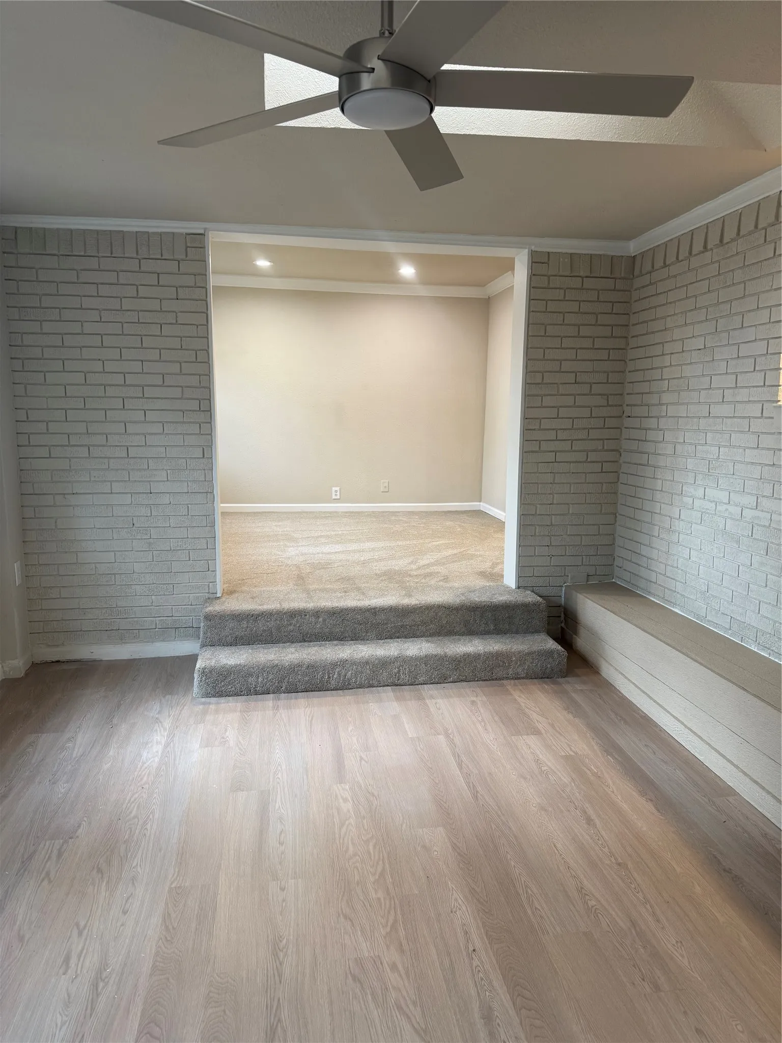 Wood-finish flooring with a multi-speed ceiling fan