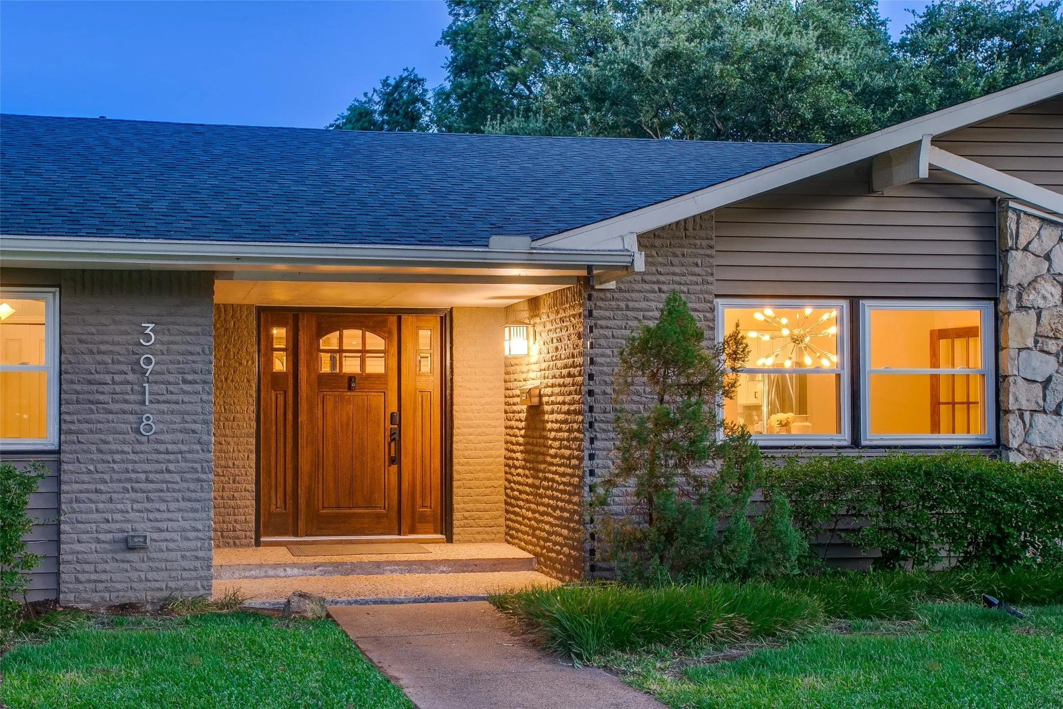 Welcoming front entry preserves the home's Mid-Century character.
