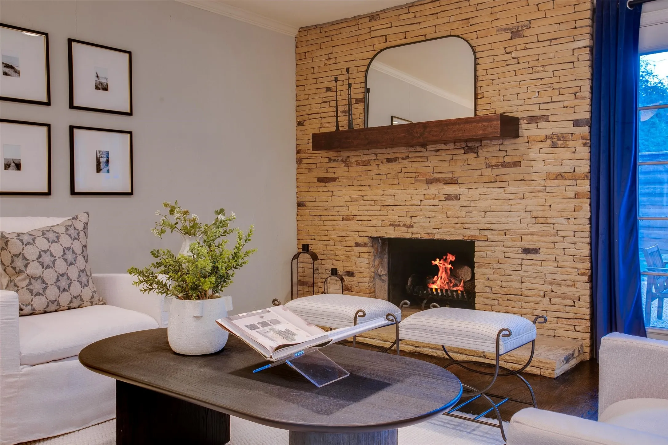 Original stone fireplace brings warmth and Mid-Century character to the main Living Room.