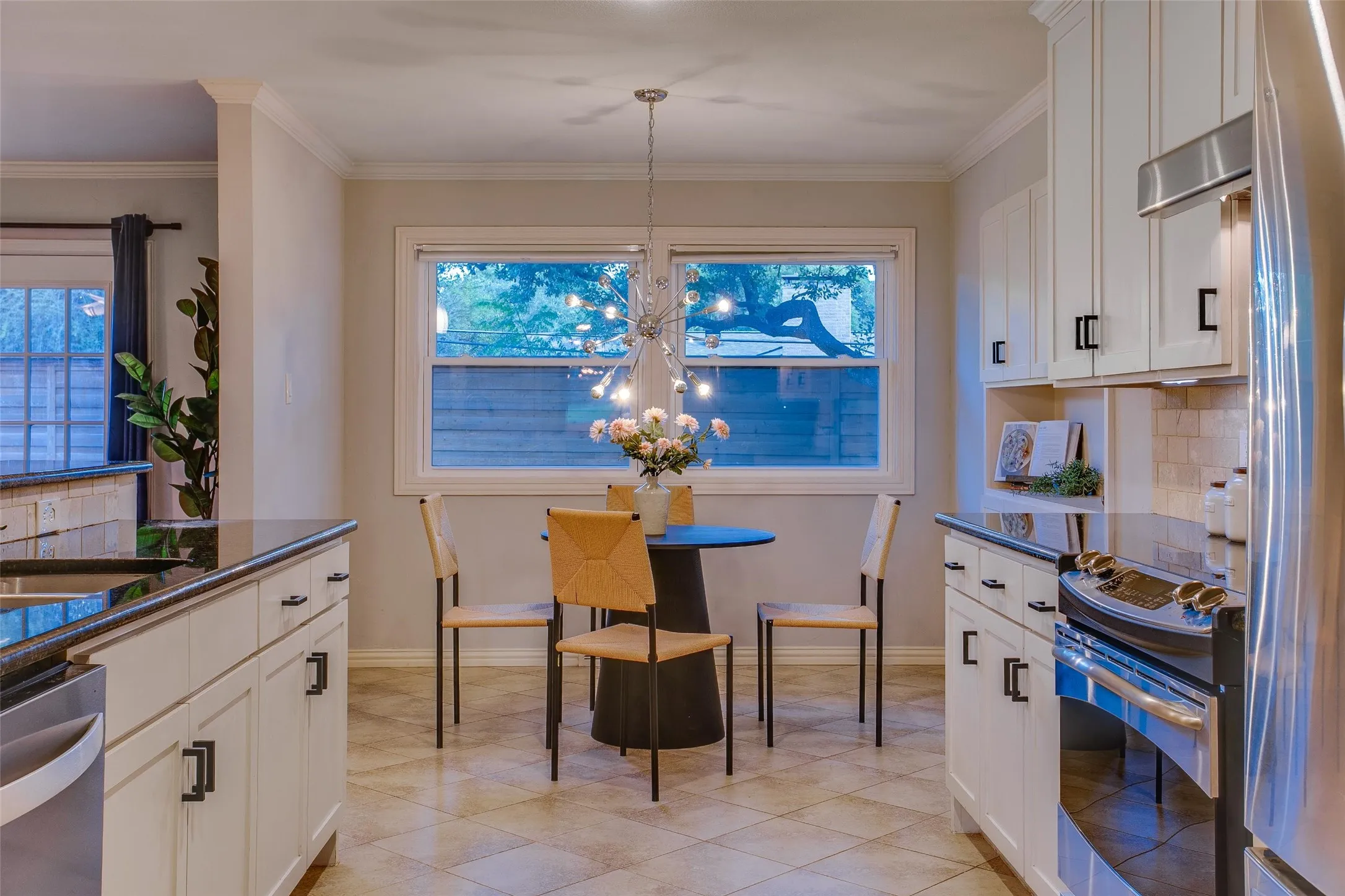 Sunny Breakfast Room overlooks the mature landscape.