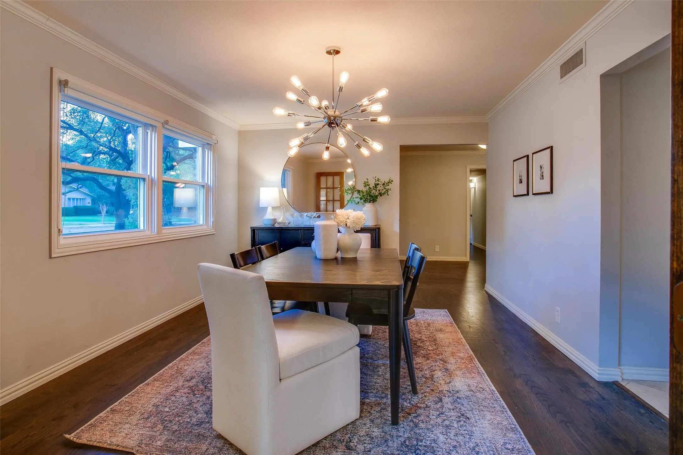 Dining Room flows naturally between the Kitchen, Home Office and main living areas.