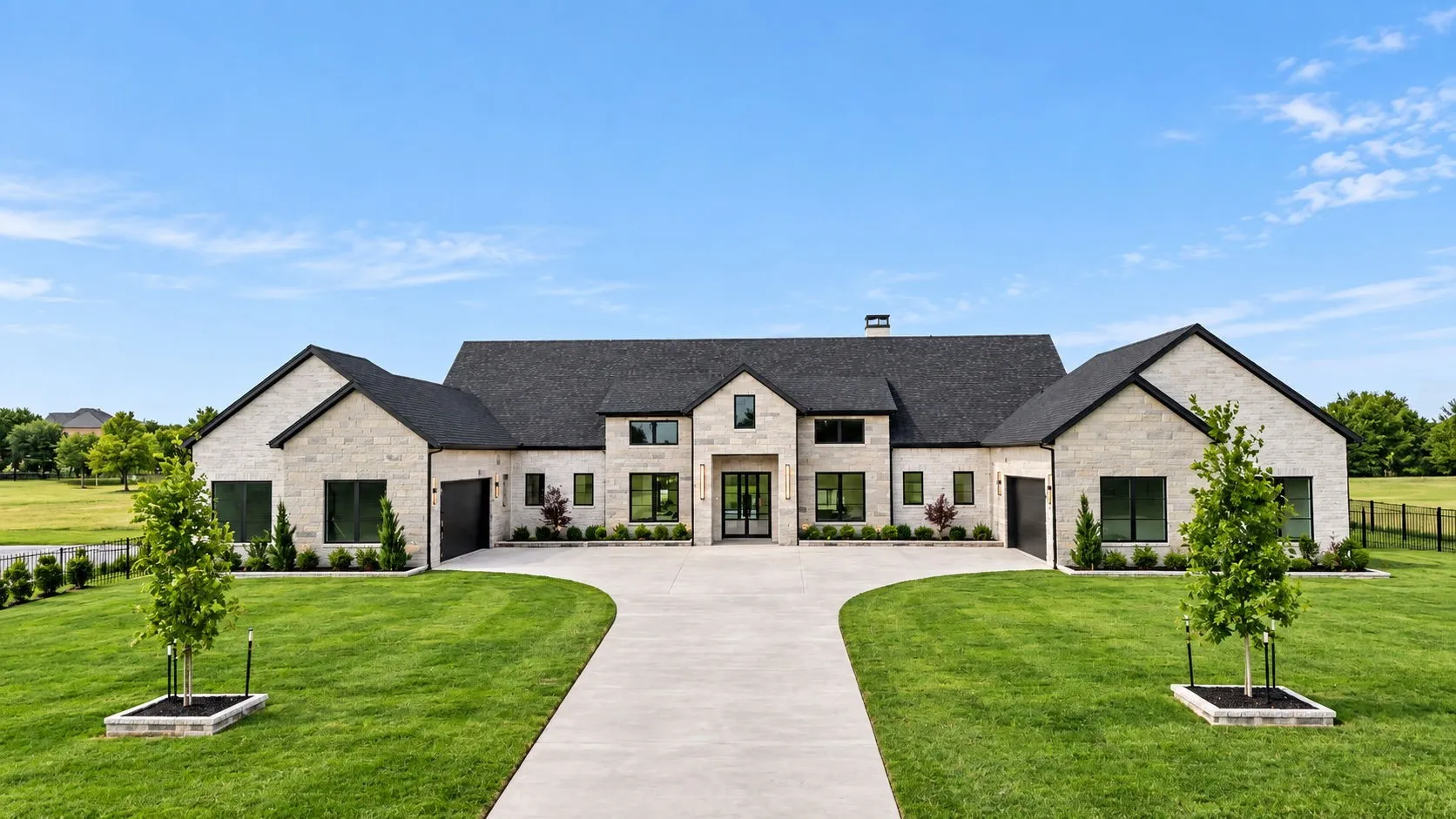 Stone facade with a dark shingle roof