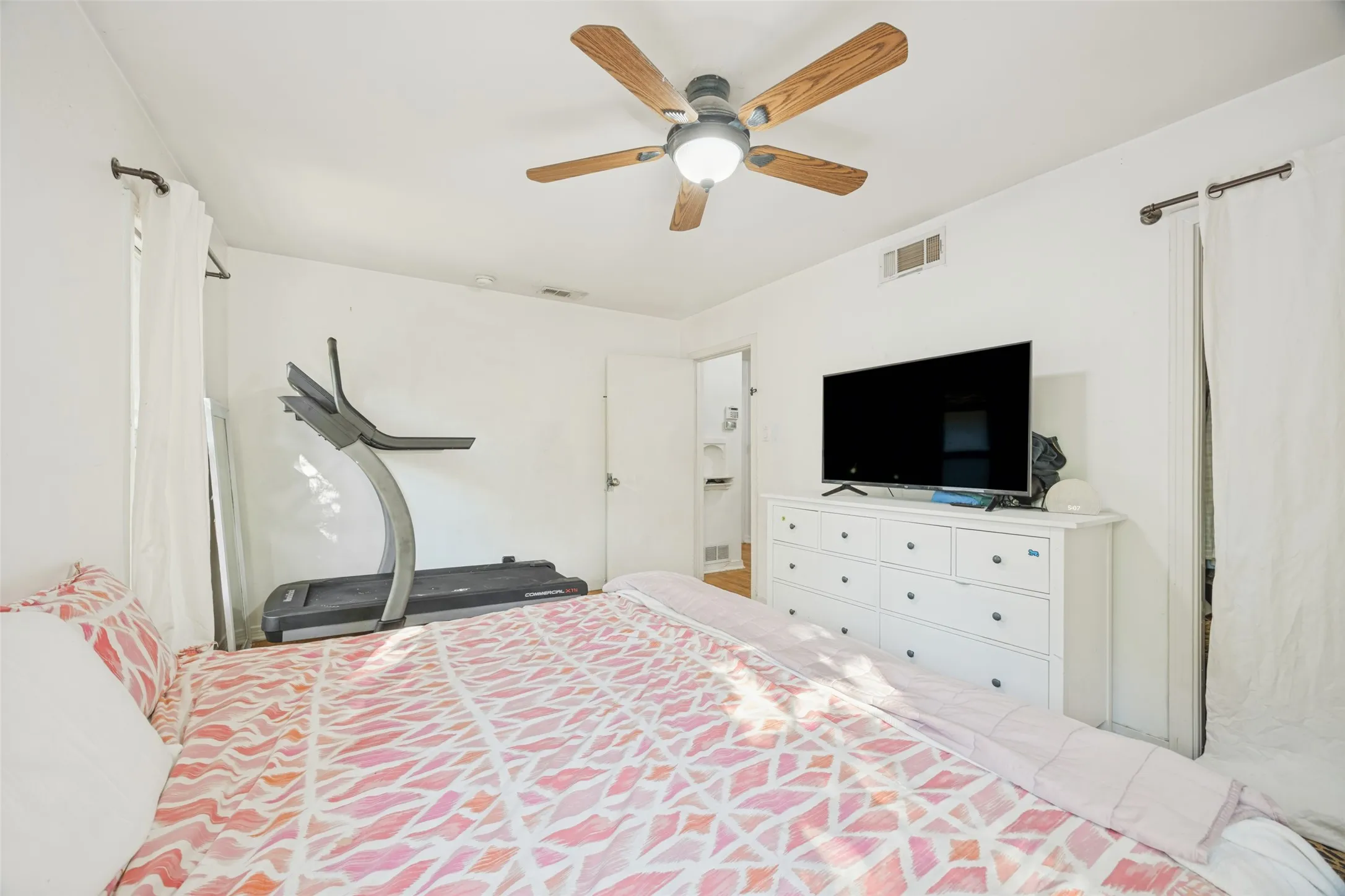 Ceiling fan with wood-finish blades