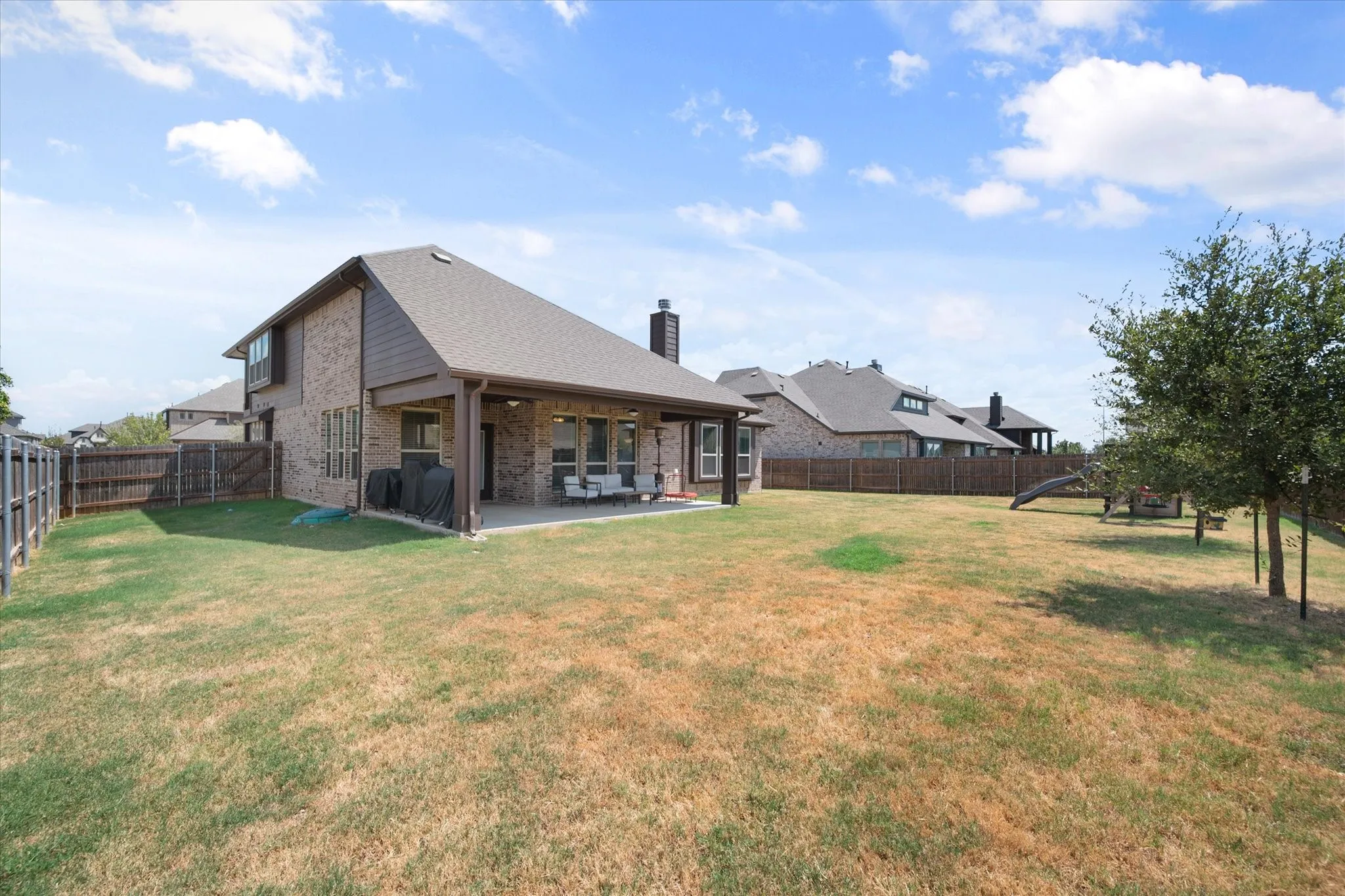Expansive backyard with all kinds of possibilites