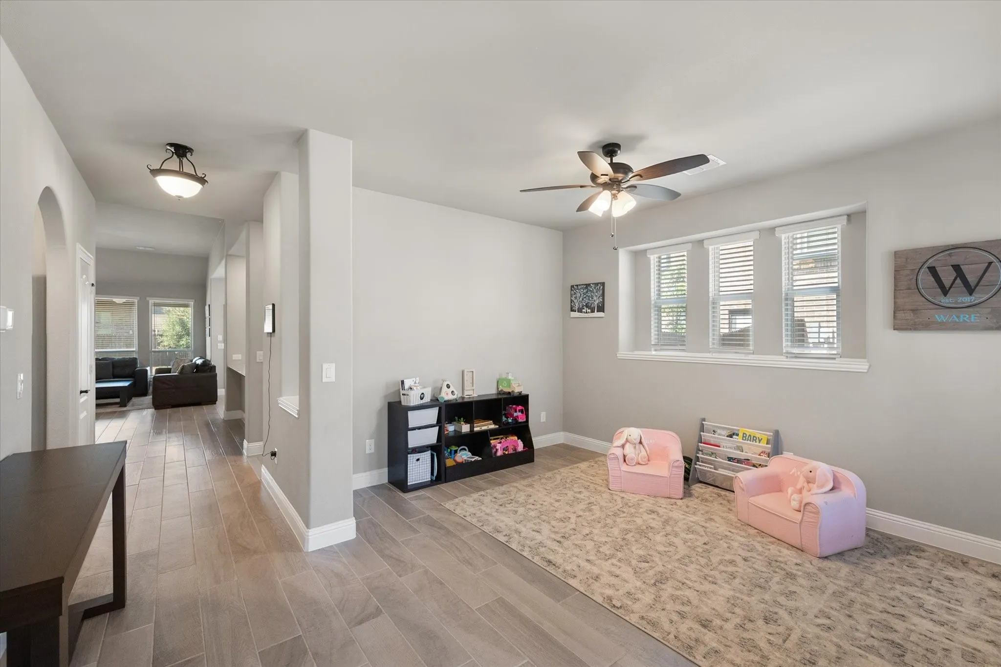 Front room can be used as a formal dining, extra living or flex space