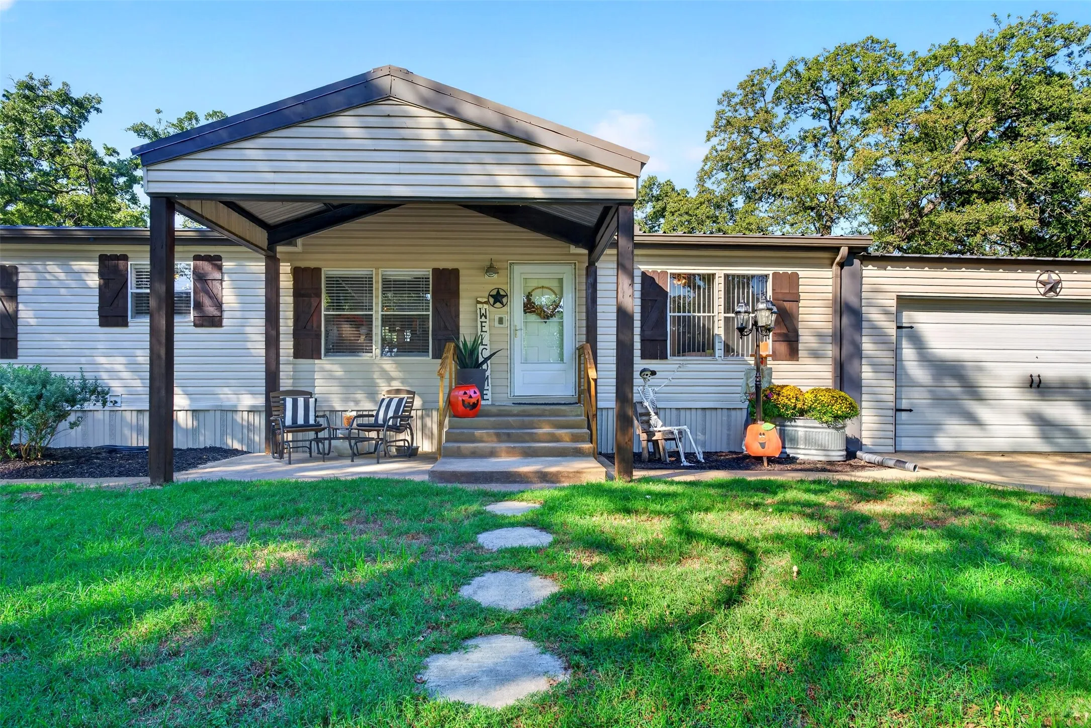 Covered front porch with concrete steps