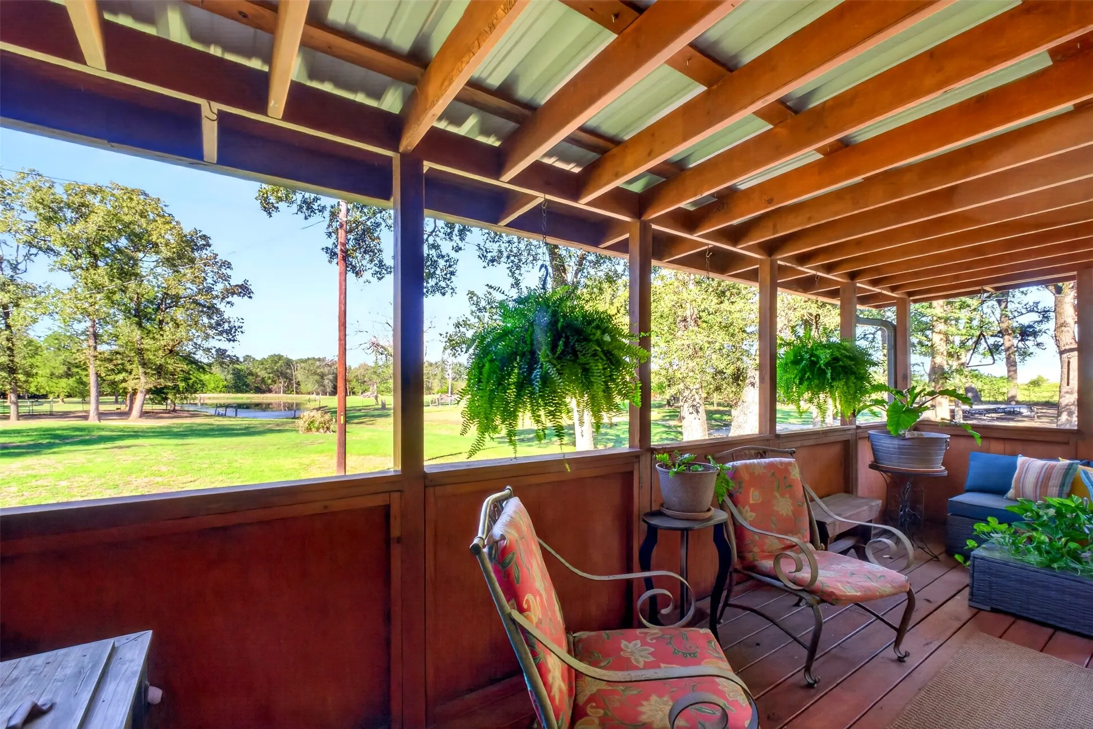 Unscreened portion of porch - Scenic view of pond from porch