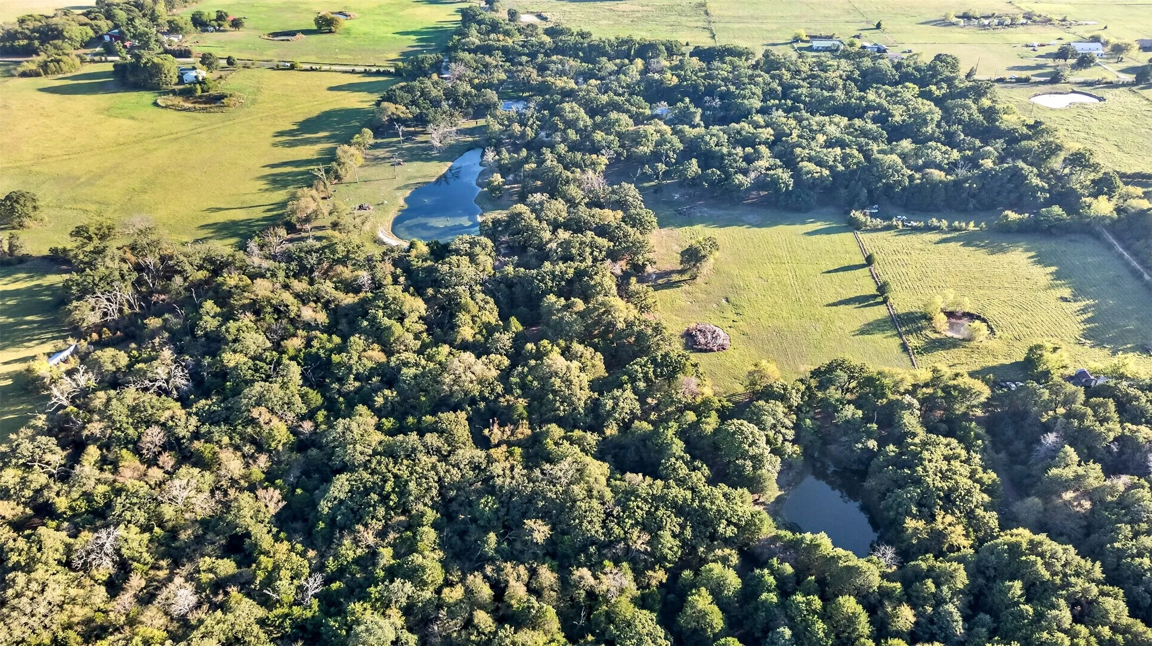 Expansive acreage with 2 ponds. one pond: 1 acre. The second pond: .5 acre.