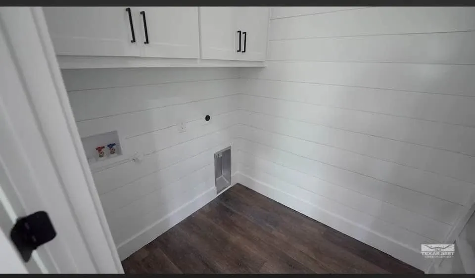 Separate laundry room for full size washer and dryer.
