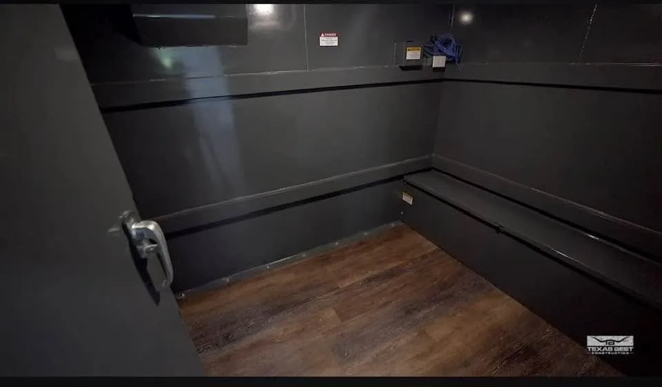 This is a rare bonus with a private 8x12 storm shelter concealed behind built-in bookshelves in the primary suite, complete with its own power, A/C, and ventilation.
