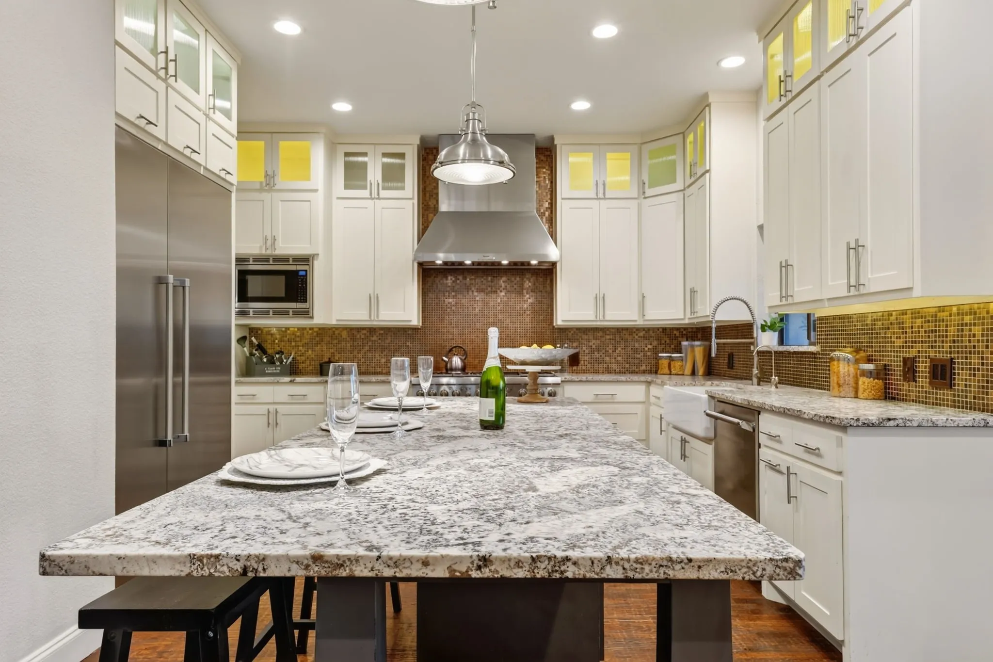 Central island with granite countertop