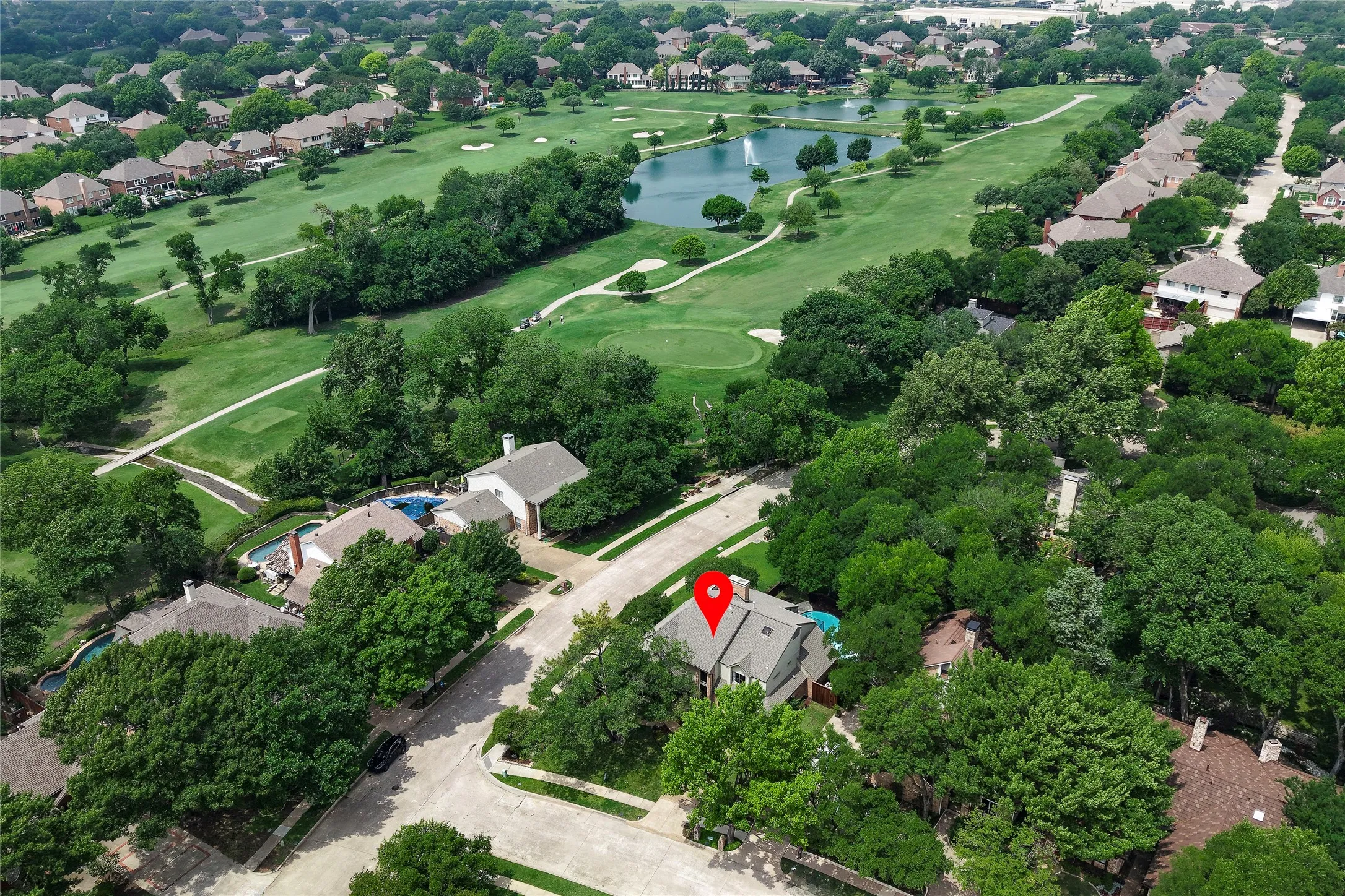 With its unique placement on the creek, rare golf course access, and proximity to the city's best amenities, this home is truly a rare gem.
