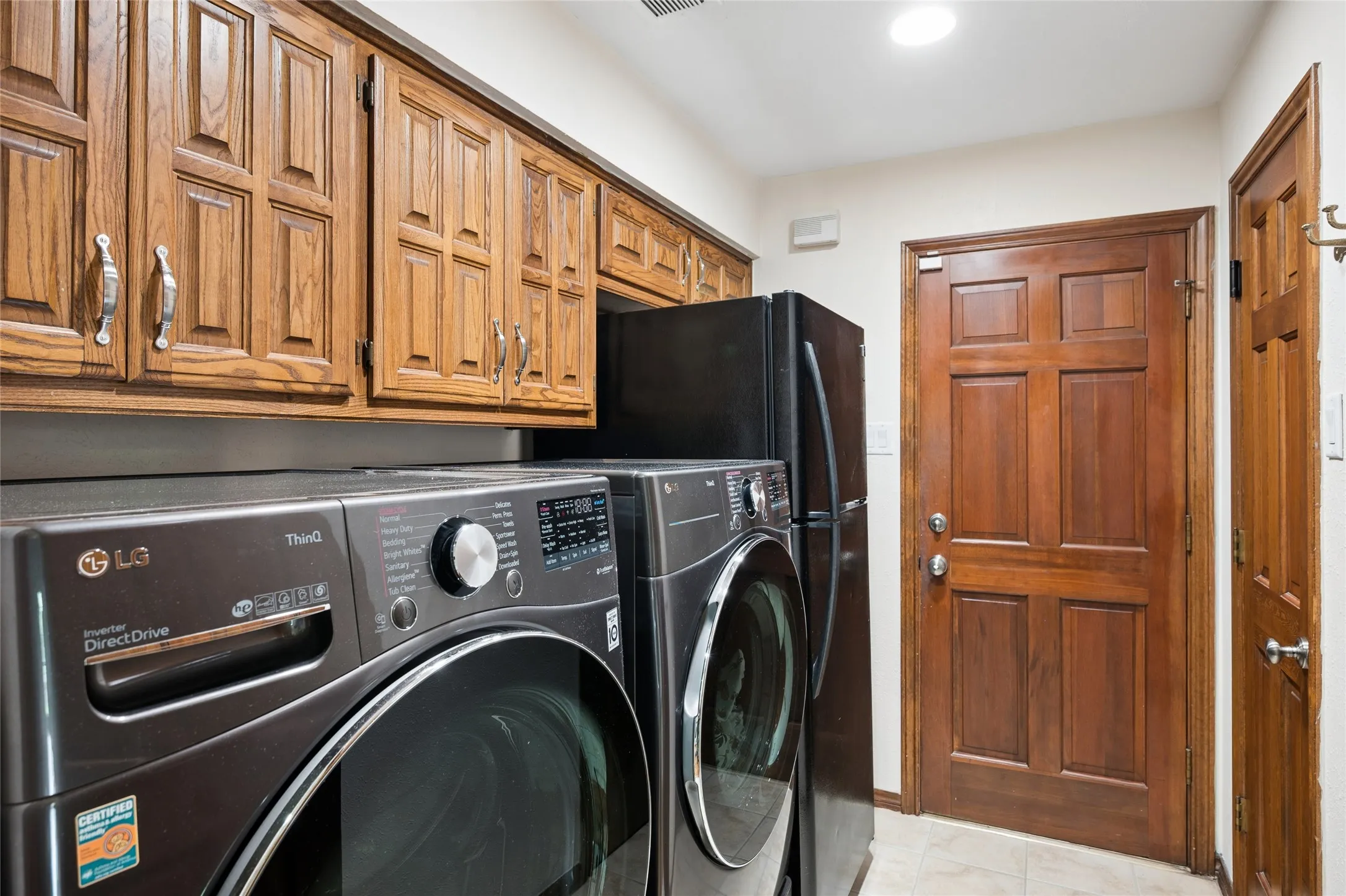 Utility room provides additional wall-closet/pantry for extra storage, room for extra fridge and direct access to the 2 car garage.
