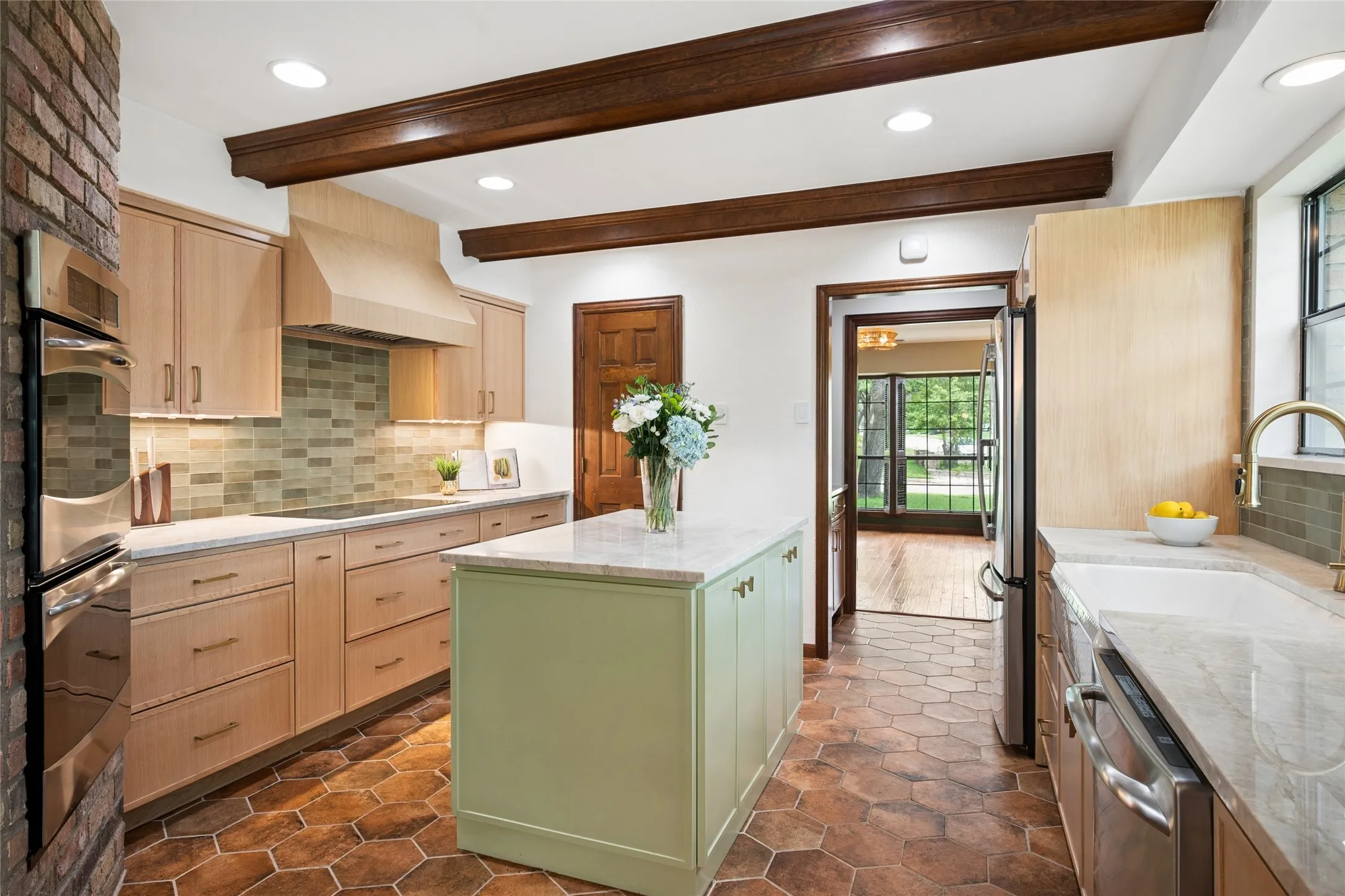 The kitchen island and ample counter space make meal prep a breeze.