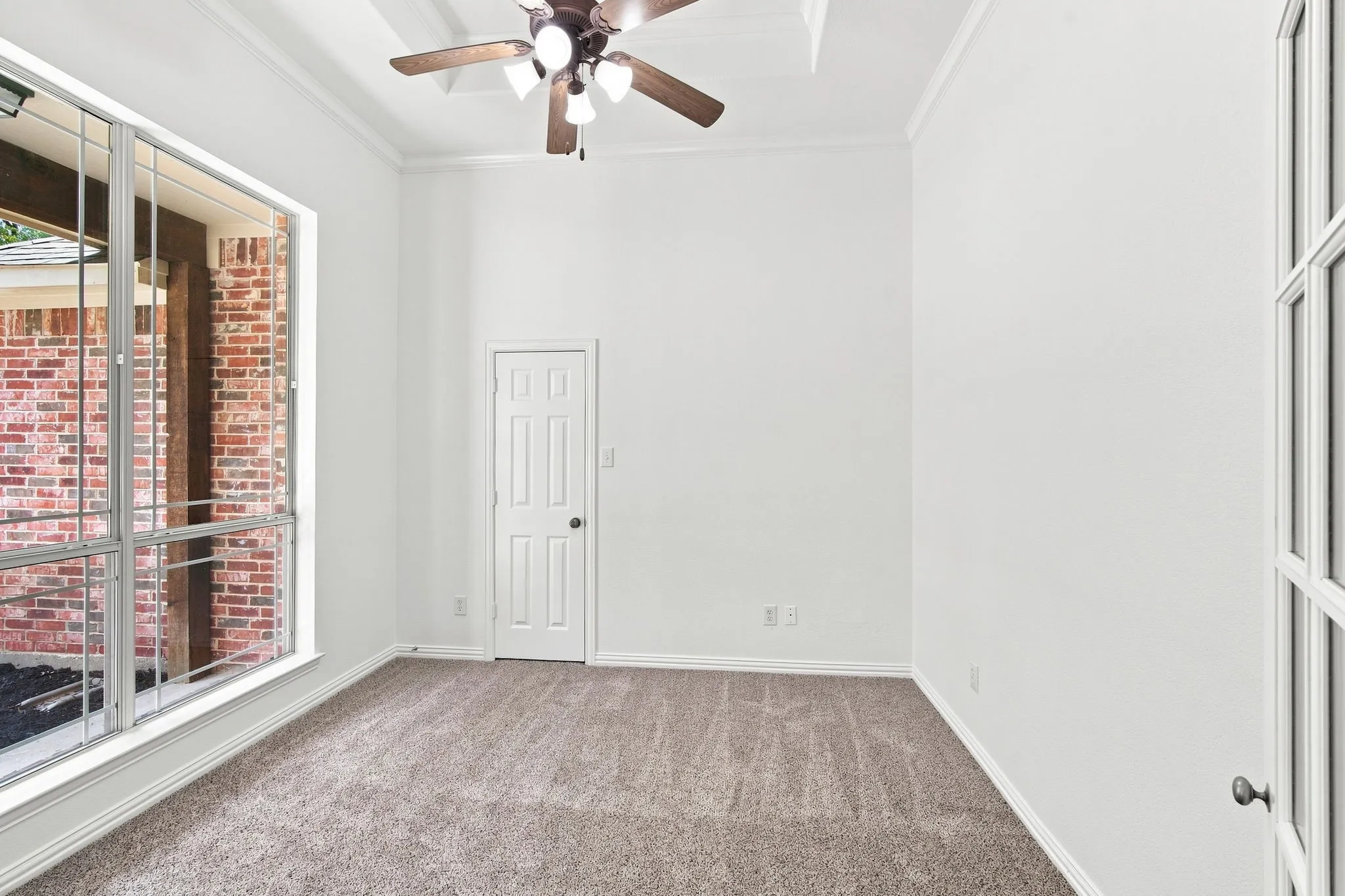 Versatile flex room just off the entry, ideal as a home office, study, or fifth bedroom.