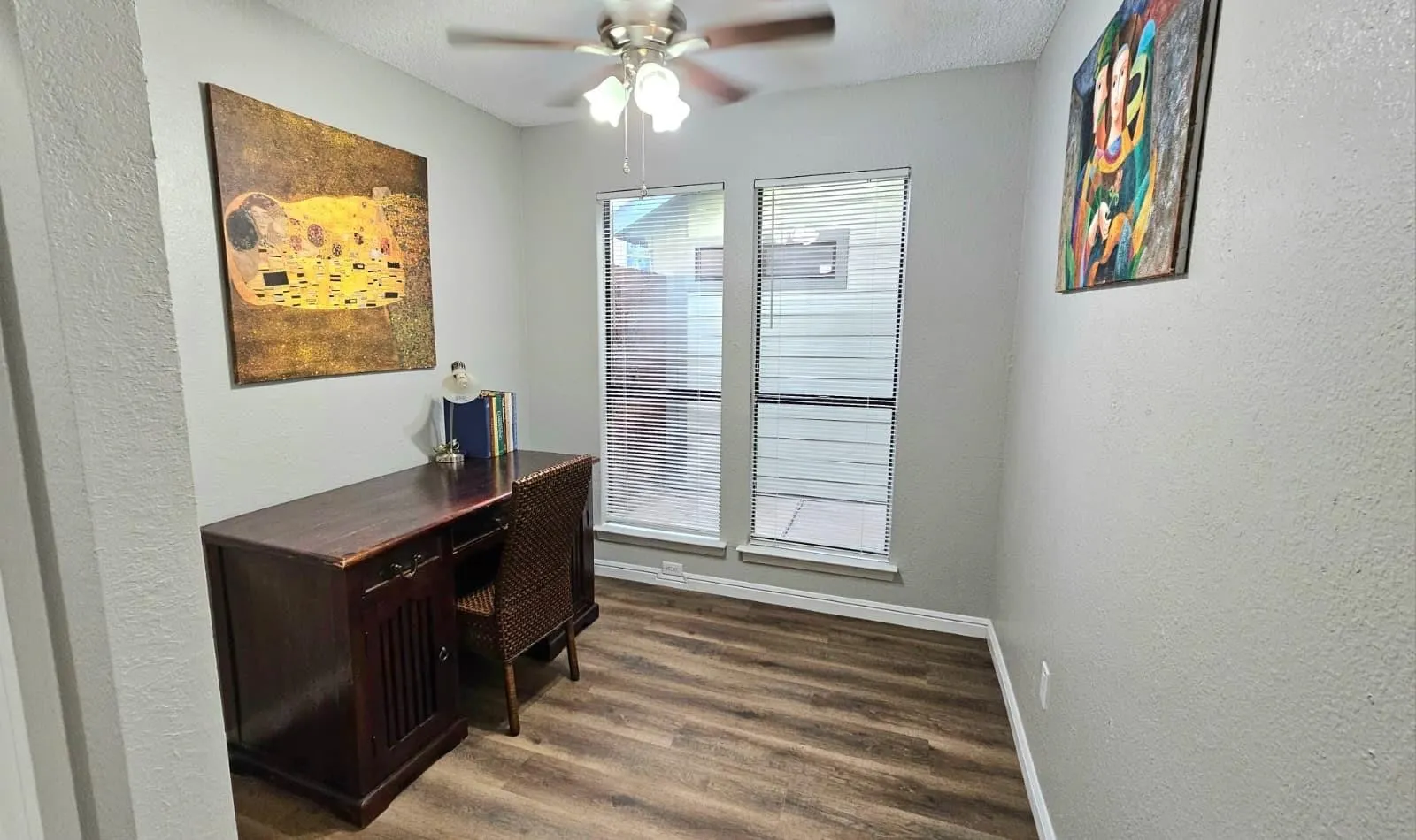 Recessed lighting, wood-finish flooring, and a ceiling fan with light fixture