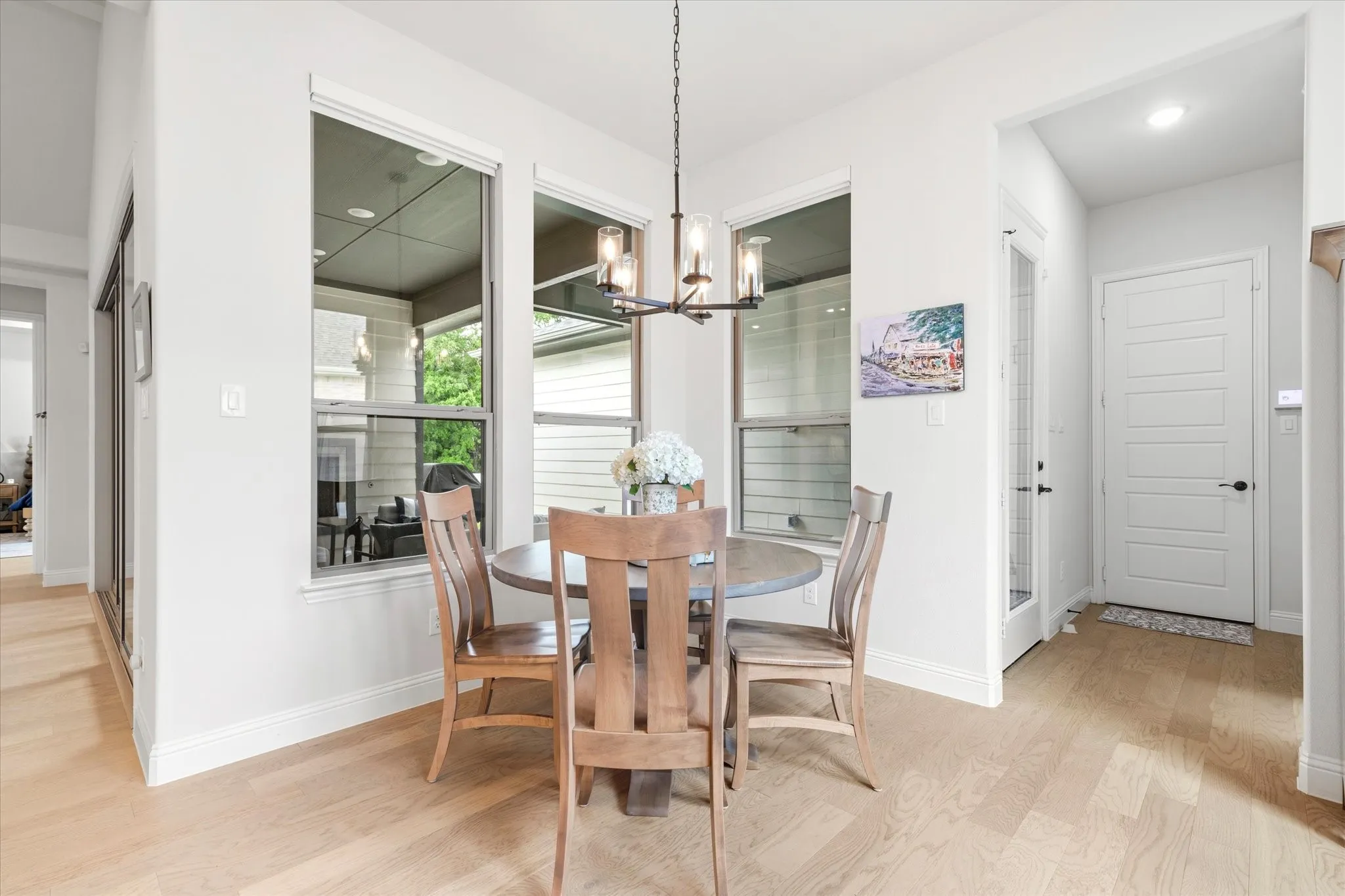 Breakfast Area that is situated right off the kitchen. The door to the right is the garage.
