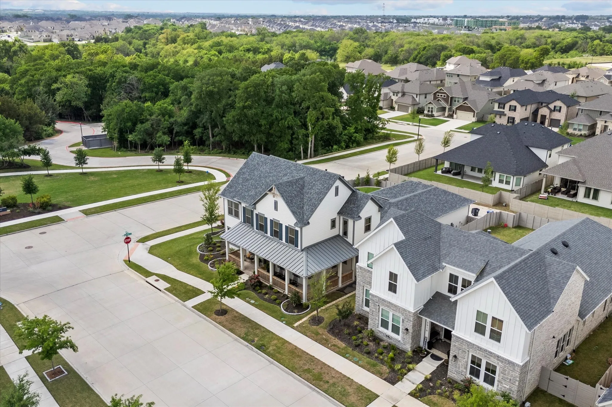 Home is situated on a corner lot across from a huge Green space and park.