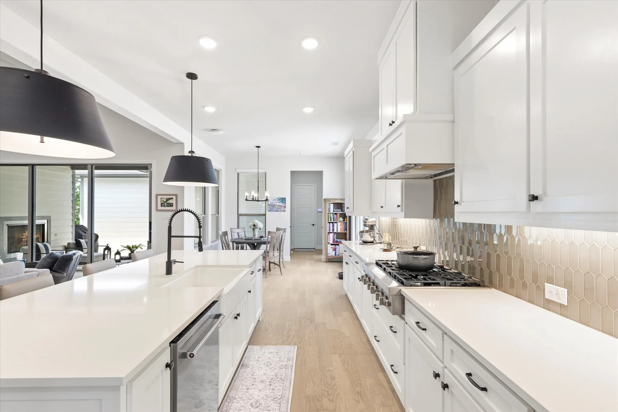 Beautiful updated kitchen leading into the breakfast area, that goes into the "mud" area, then the garage.