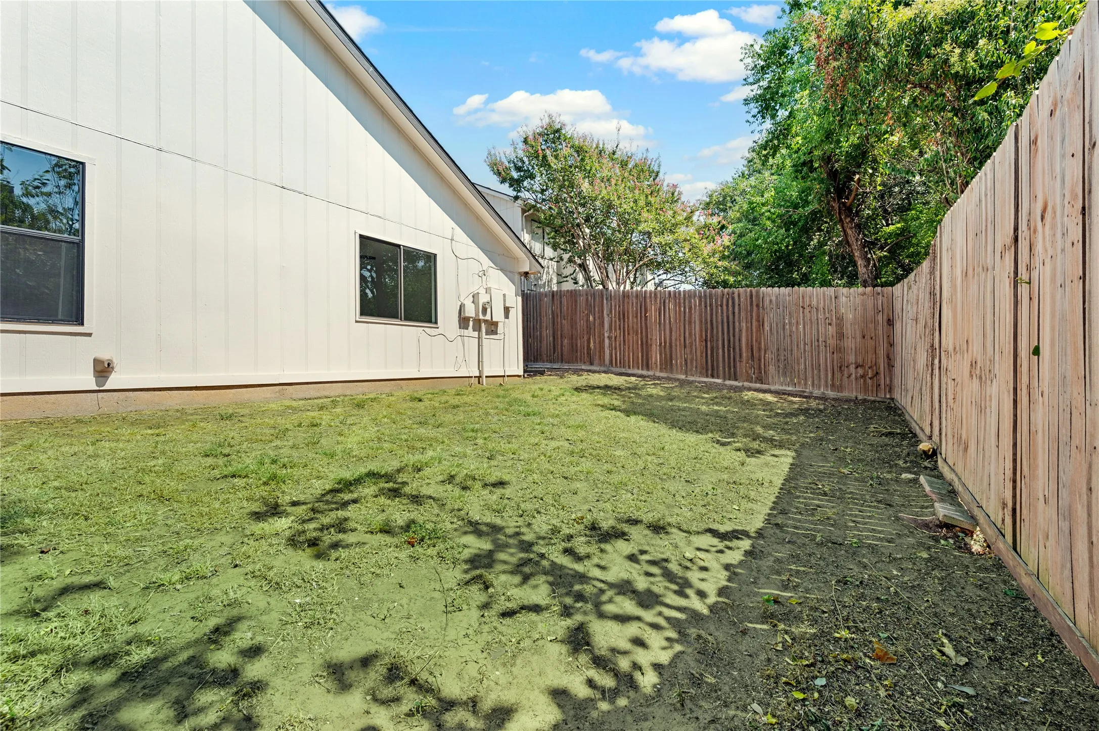 Yard photos have been digitally enhanced to depict green grass.