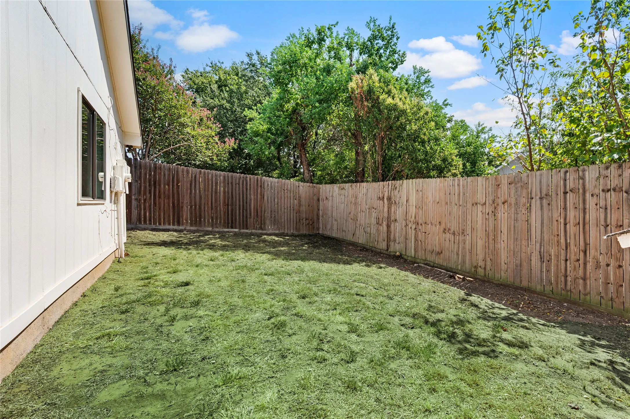 Yard photos have been digitally enhanced to depict green grass.