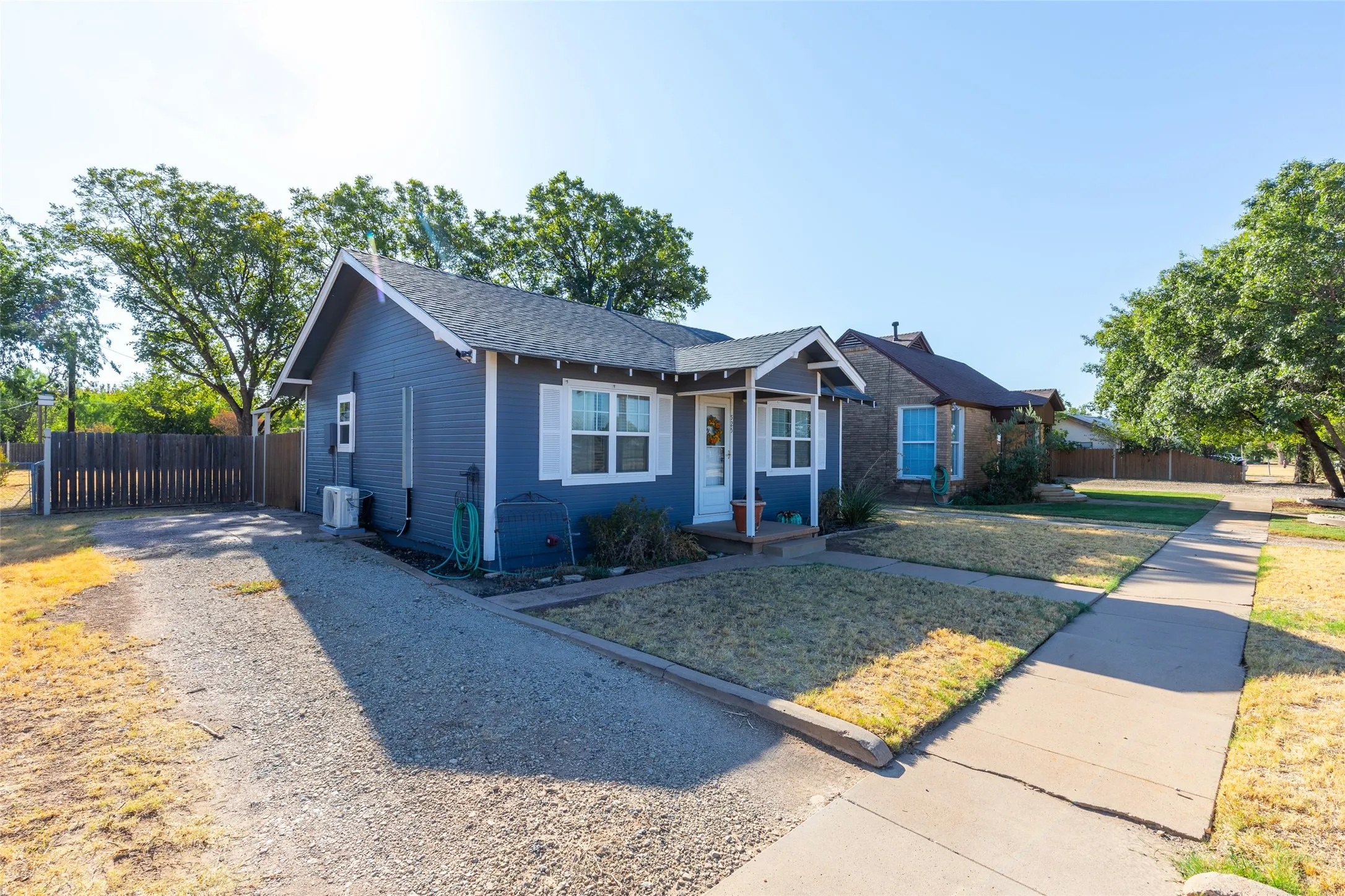 Blue siding exterior with white trim