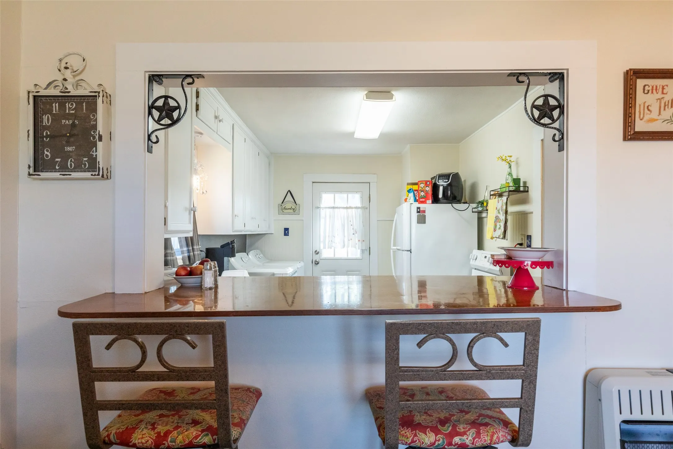 Breakfast bar with a polished wood-finish countertop