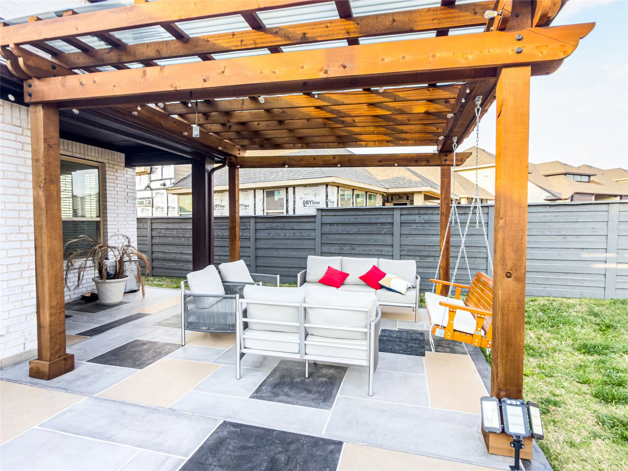 View of patio with an outdoor living space and a pergola