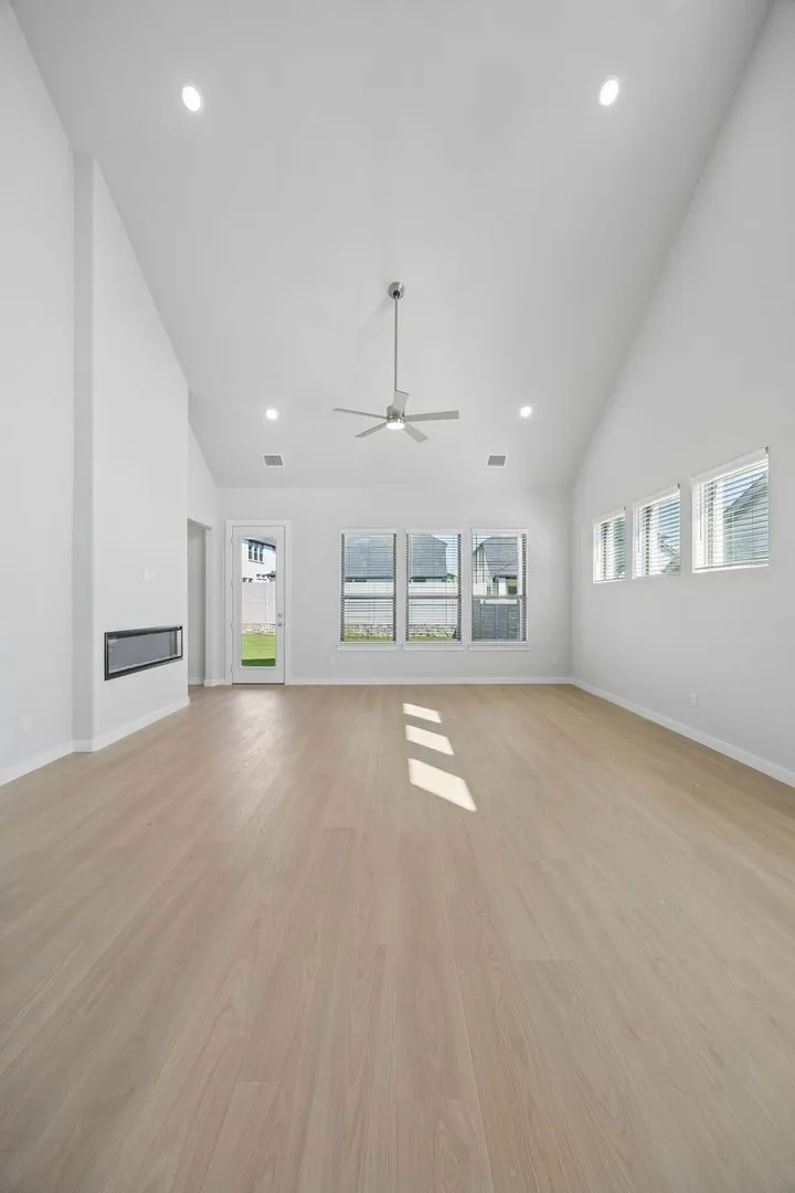 Living Room in the Monet II home plan by Trophy Signature Homes – REPRESENTATIVE PHOTO