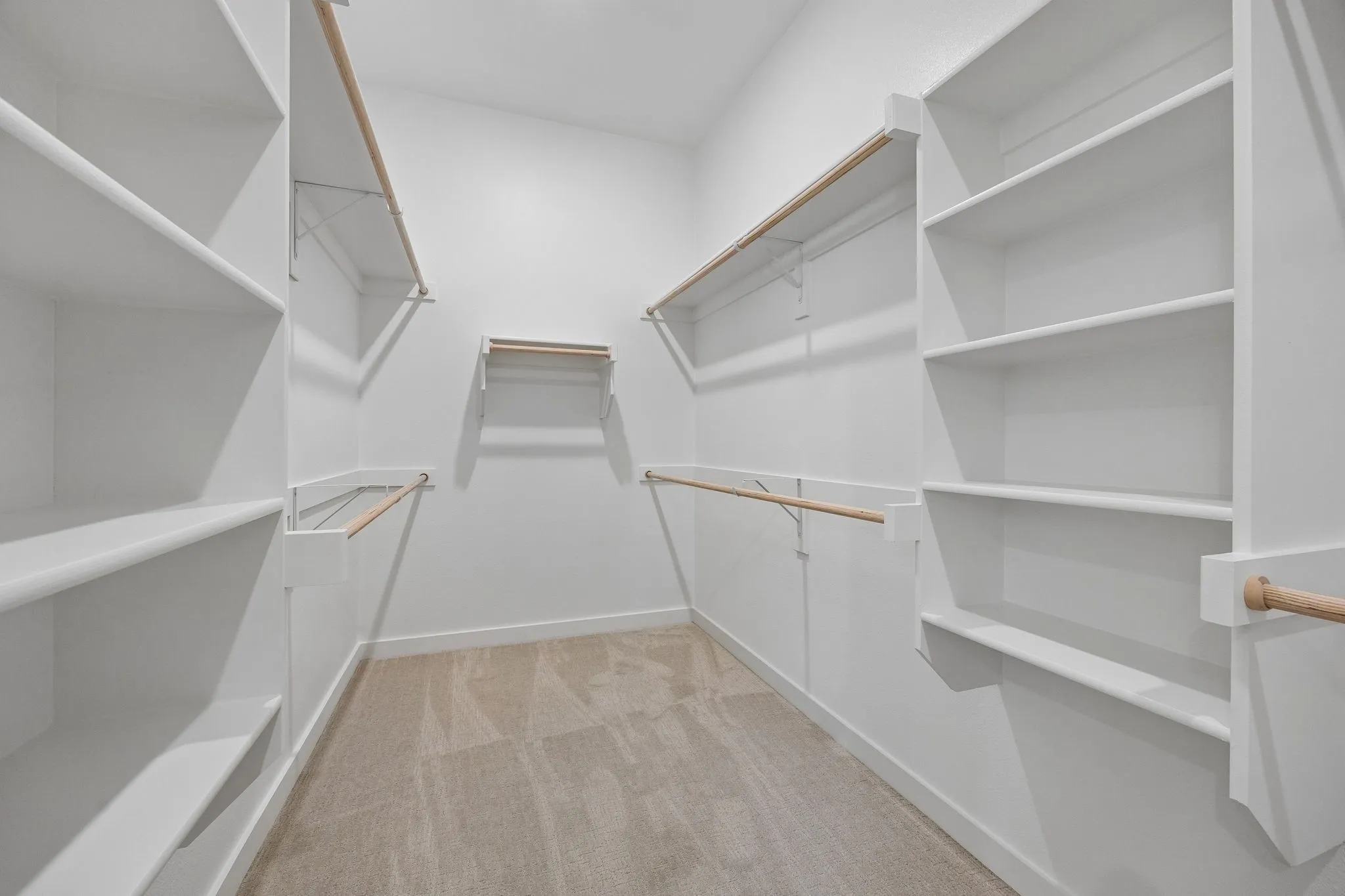 Primary Closet in the Monet II home plan by Trophy Signature Homes – REPRESENTATIVE PHOTO