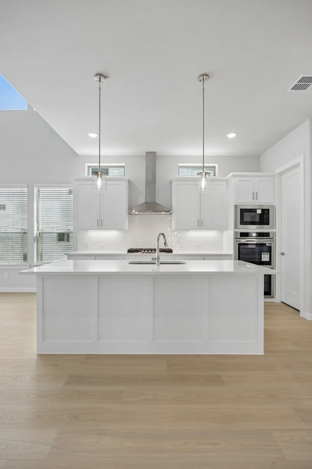 Kitchen in the Monet II home plan by Trophy Signature Homes – REPRESENTATIVE PHOTO