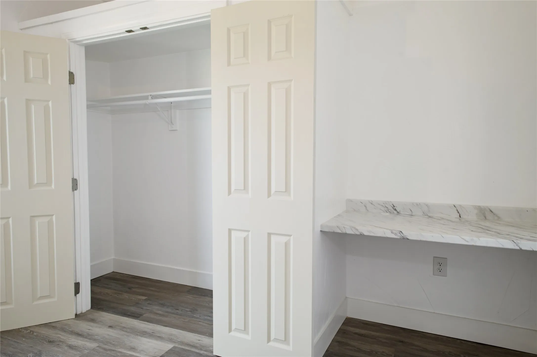 Bedroom with built in desk