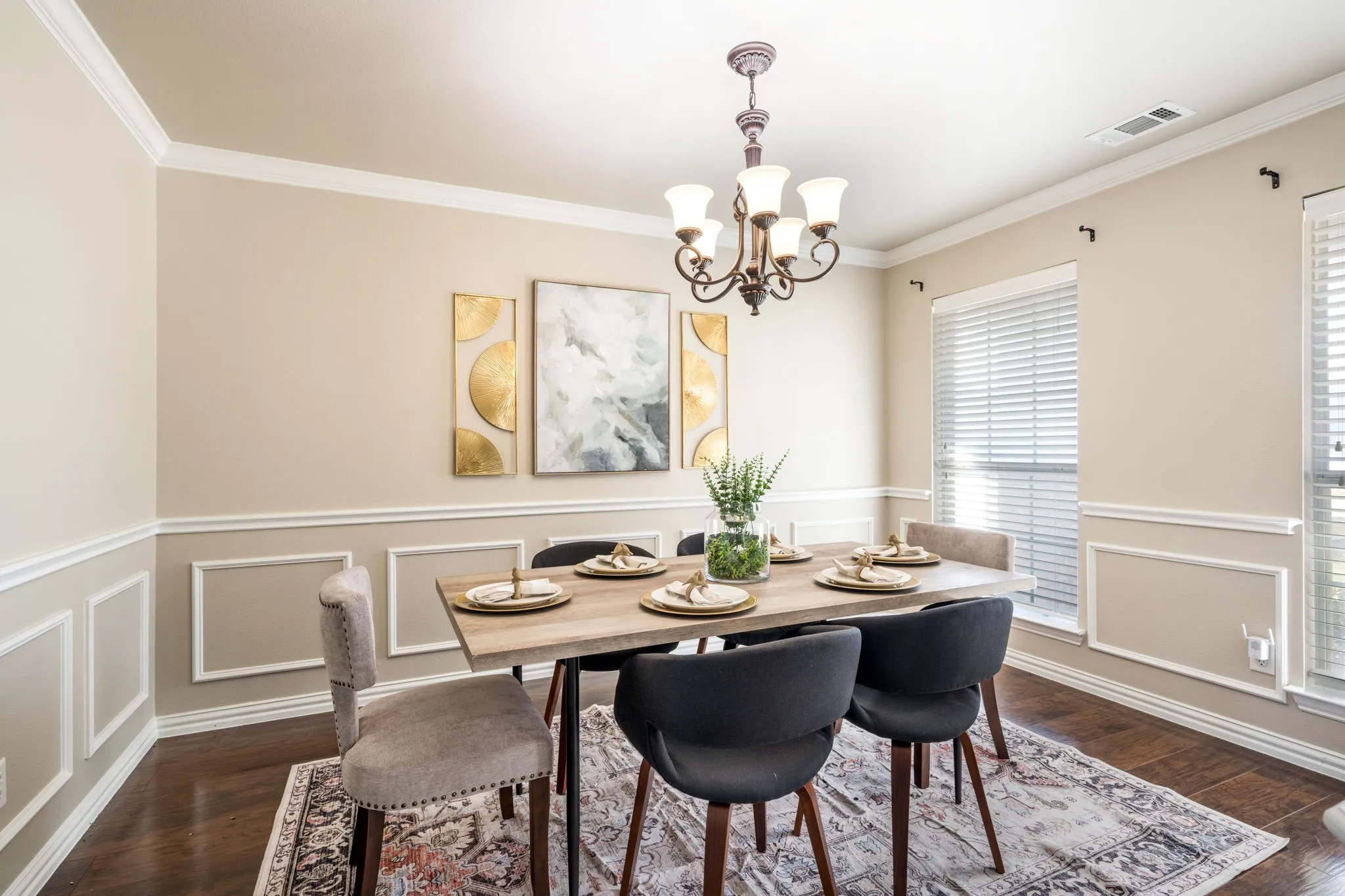 Recessed lighting, crown molding, chair rail molding, wood-finish flooring, and a chandelier lighting fixture