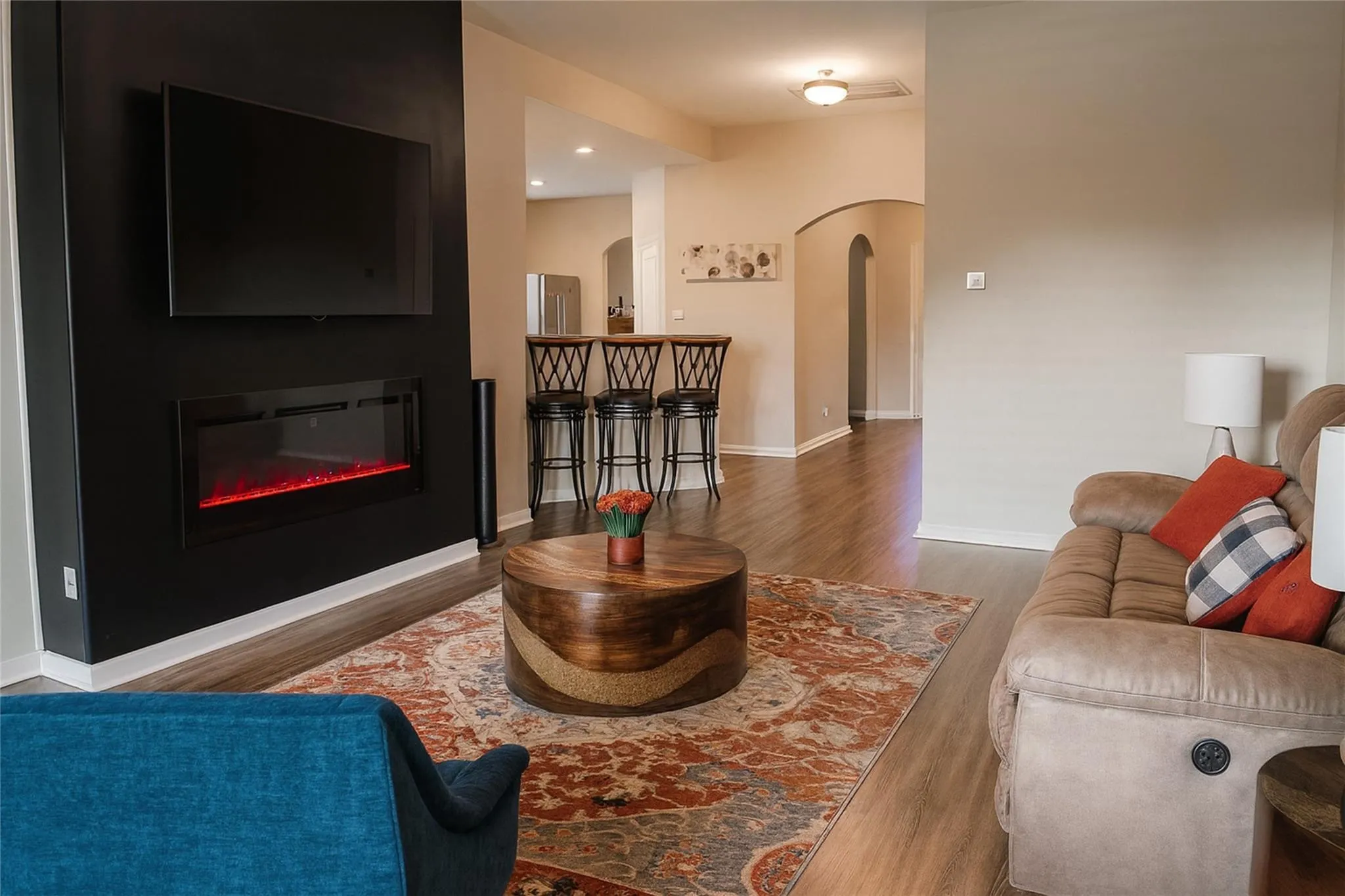 Accent wall featuring a built-in electric fireplace