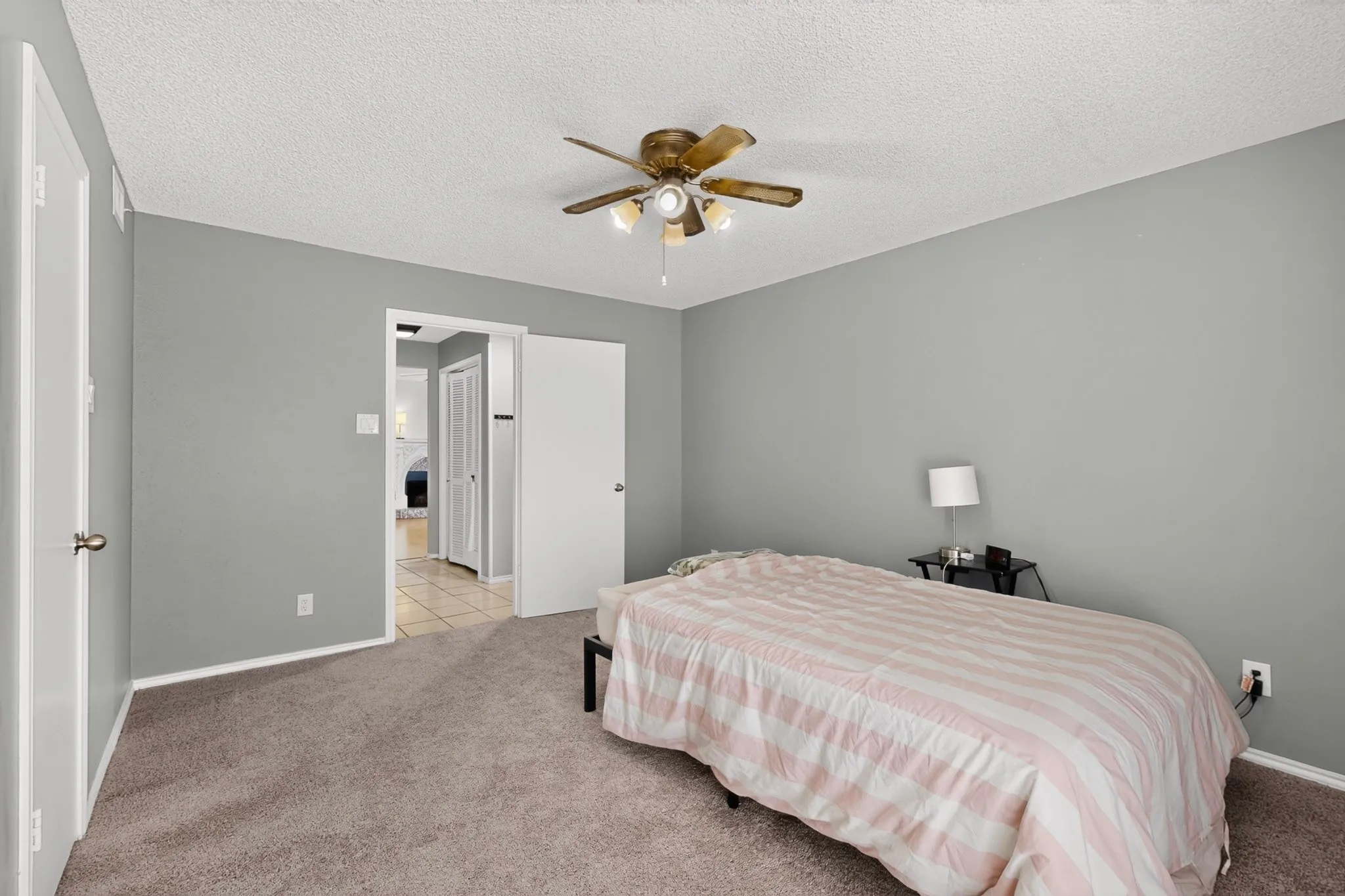 Wall-to-wall carpeting, ceiling fan with integrated lighting, and painted​​‌​​​​‌​​‌‌​‌‌​​​‌‌​‌​‌​‌​​​‌​​ walls