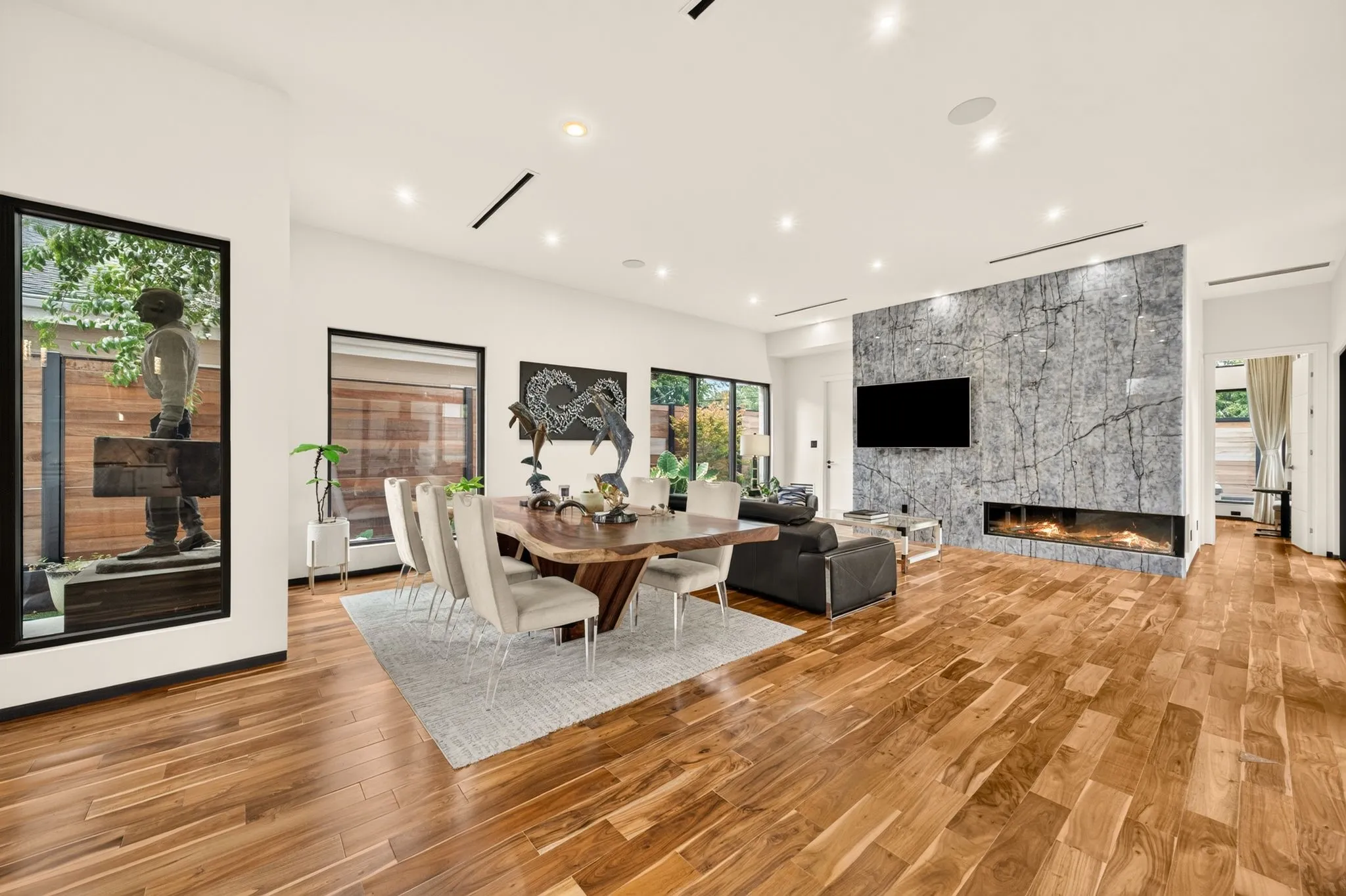 Hardwood flooring, recessed lighting, and large​​‌​​​​‌​​‌‌​‌‌​​​‌‌​‌​‌​‌​​​‌​​ windows