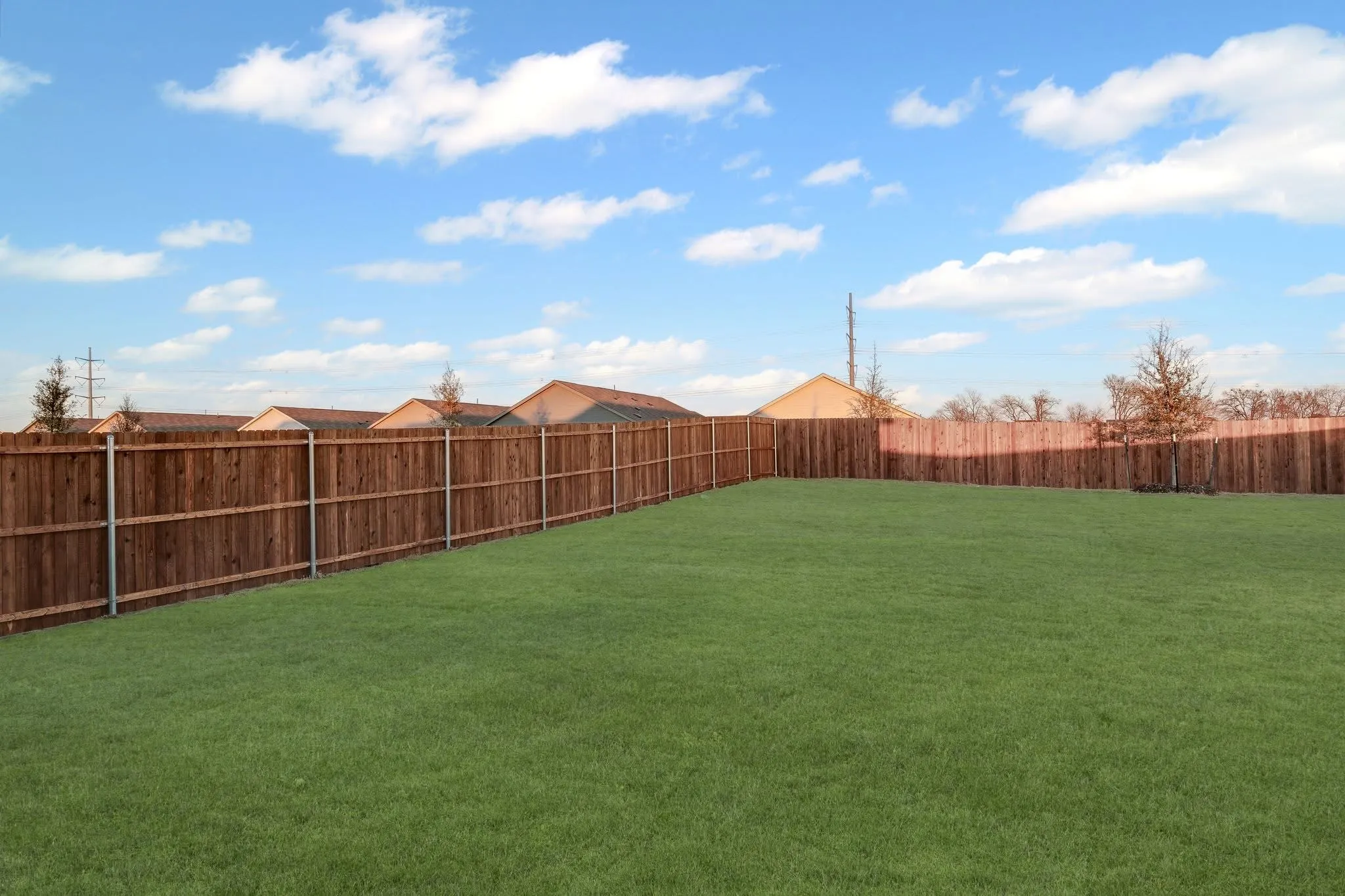 View of yard featuring a fenced backyard